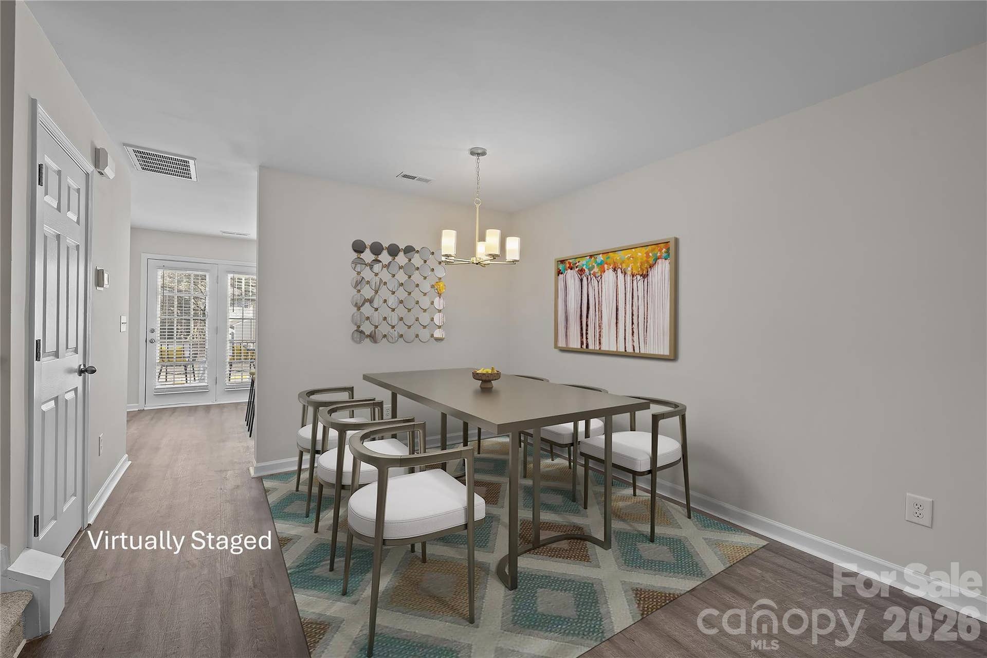 Nicely sized dining area, positioned between the living room and kitchen is ideal for everyday meals or entertaining. Open flow design keeps the space connected while maintaining clear definition.
