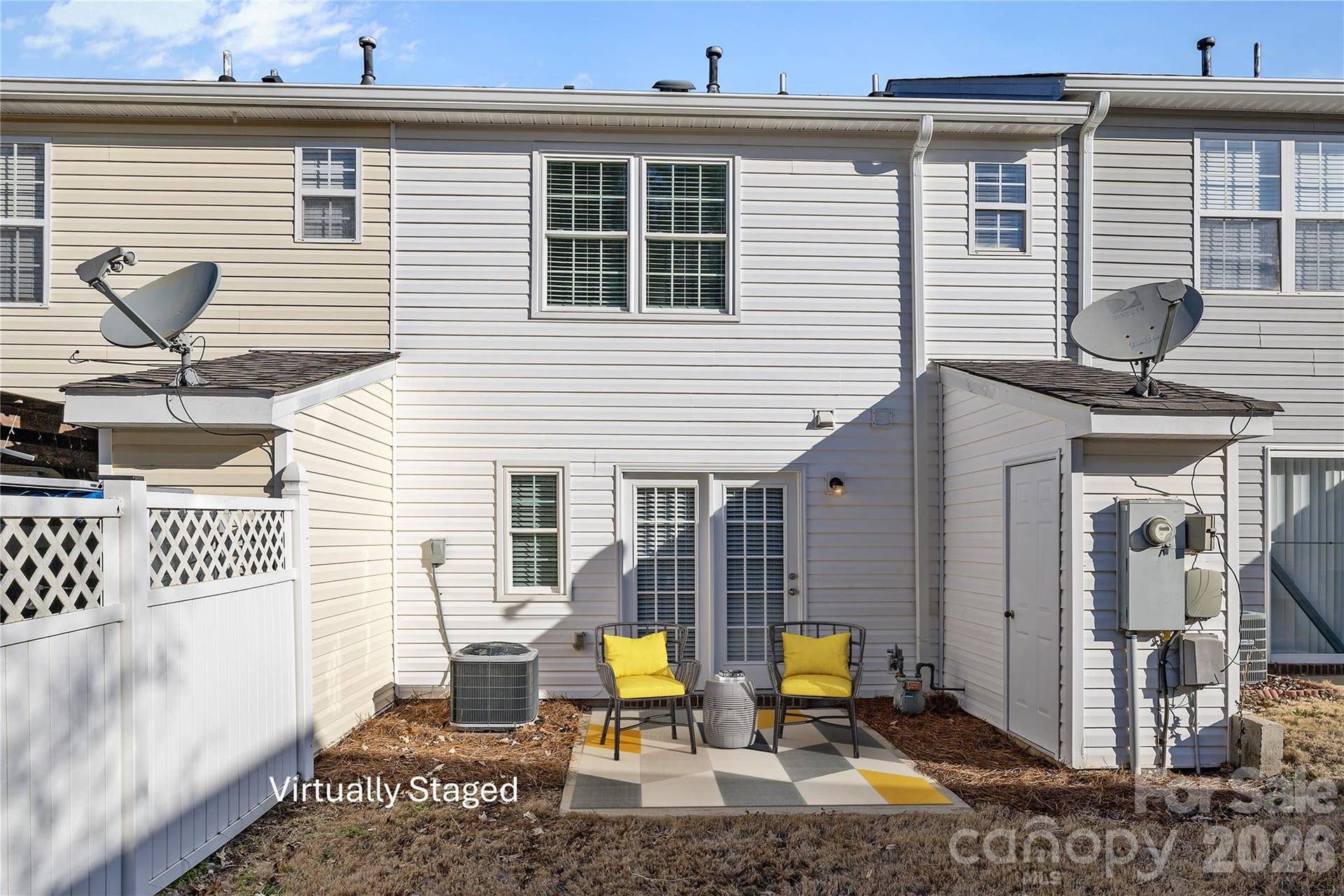 A low-maintenance outdoor space ideal for relaxing or grilling.