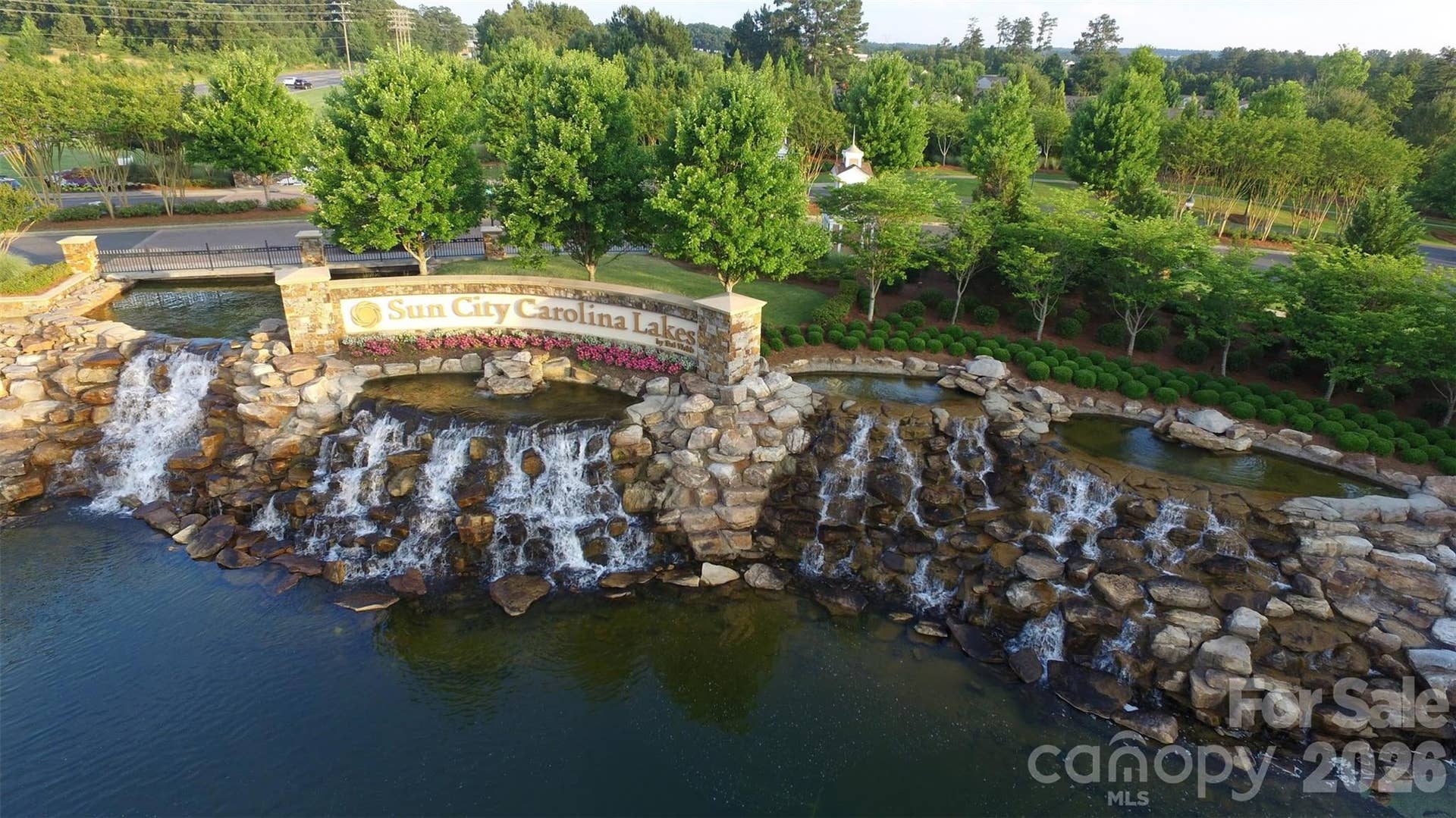 57106 Nightingale Way, Indian Land, SC 29707 The majestic entrance to Sun City Carolina Lakes welcomes residents and guests to this premier active adult community. Come live the dream!