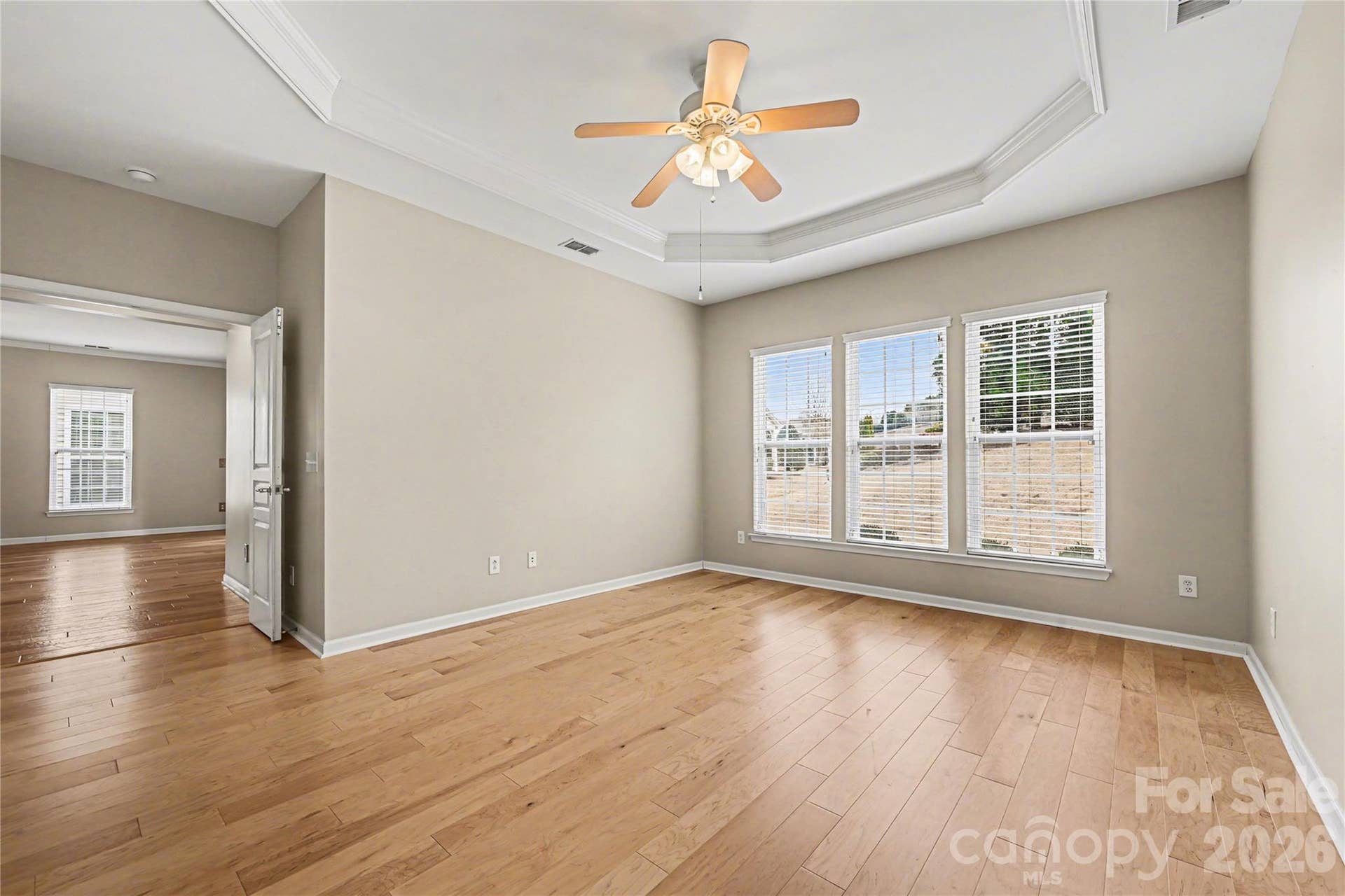 57106 Nightingale Way, Indian Land, SC 29707 Spacious primary bedroom overlooks the backyard.