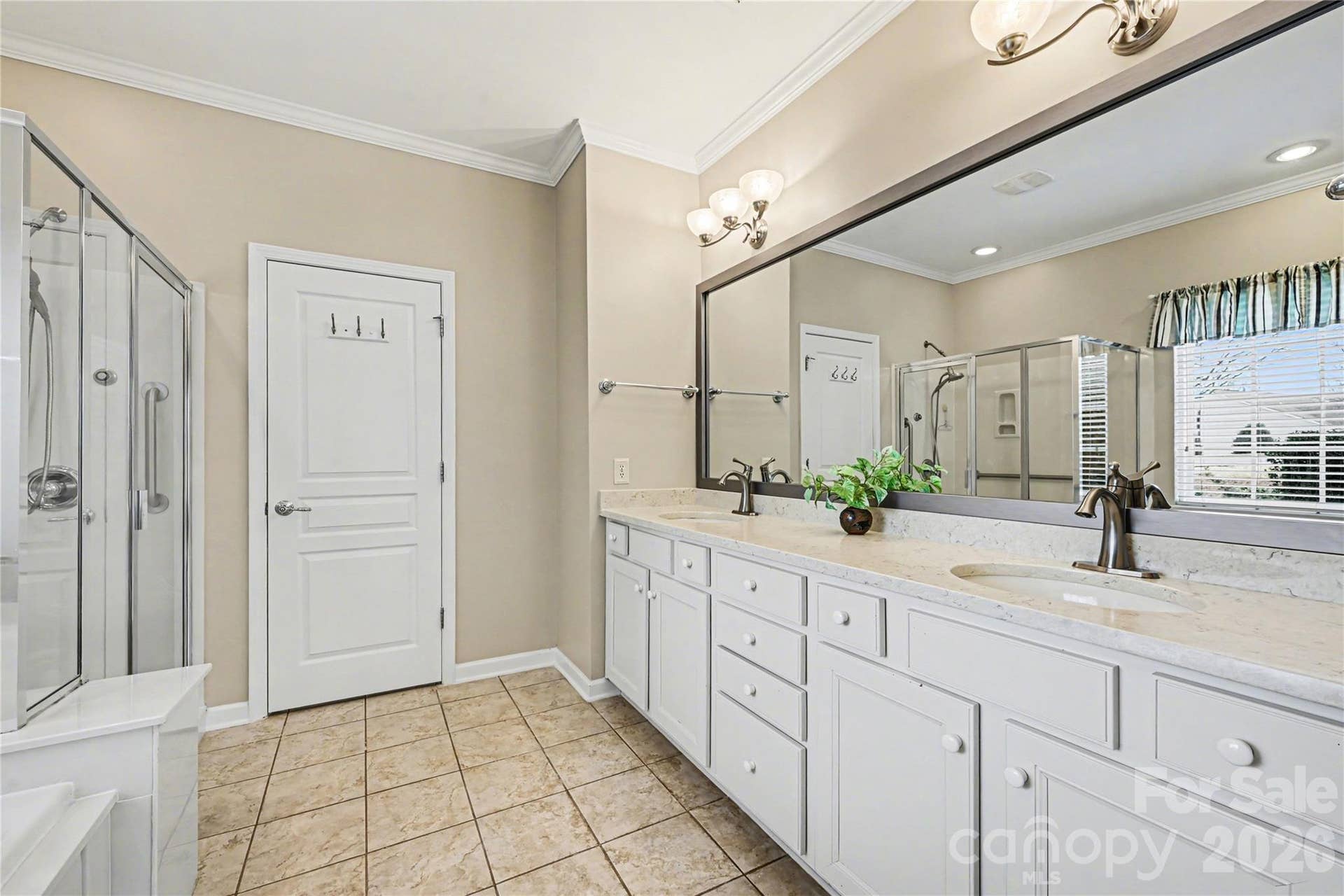 57106 Nightingale Way, Indian Land, SC 29707 Ensuite primary bathroom features double sinks.