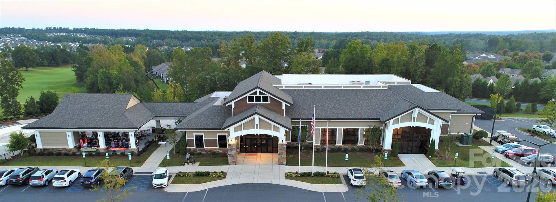 57106 Nightingale Way, Indian Land, SC 29707 The Lodge houses an outdoor pool, pickleball courts, outside workout stations, a pavilion and open outdoor area where you can relax by the large firepit. It is home to SCCL's Performing Arts Club and the interior ballroom is used for performances and a wide variety of SCCL club and social activities. SCCL Veterans are honored both inside and outside of The Lodge. Be sure to check out the tributes to our Vets in the lobby and at the Veterans Memorial near the pavilion.