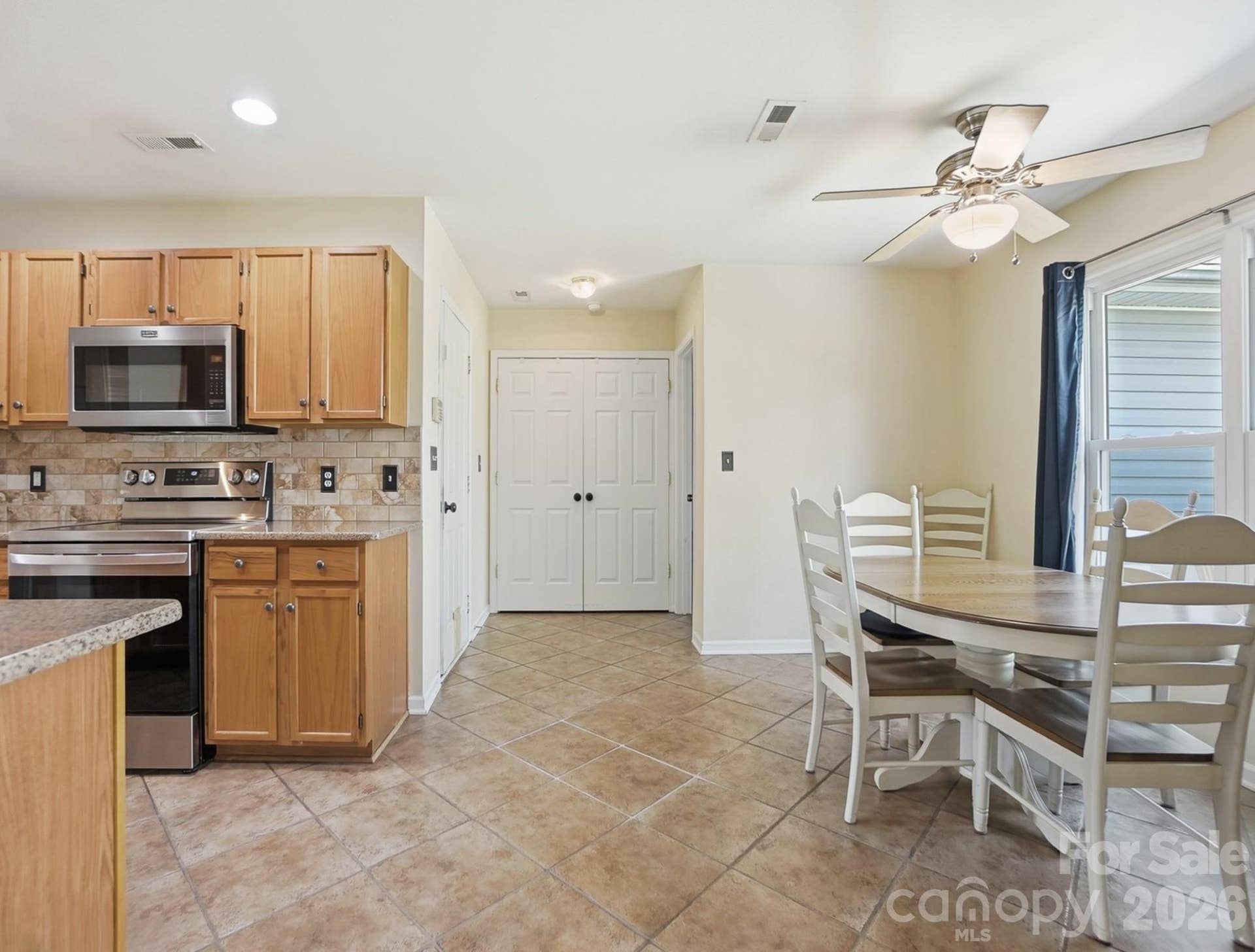 1009 Onotoa Drive, Indian Trail, NC 28079 Kitchen flows into one of two primary bedrooms