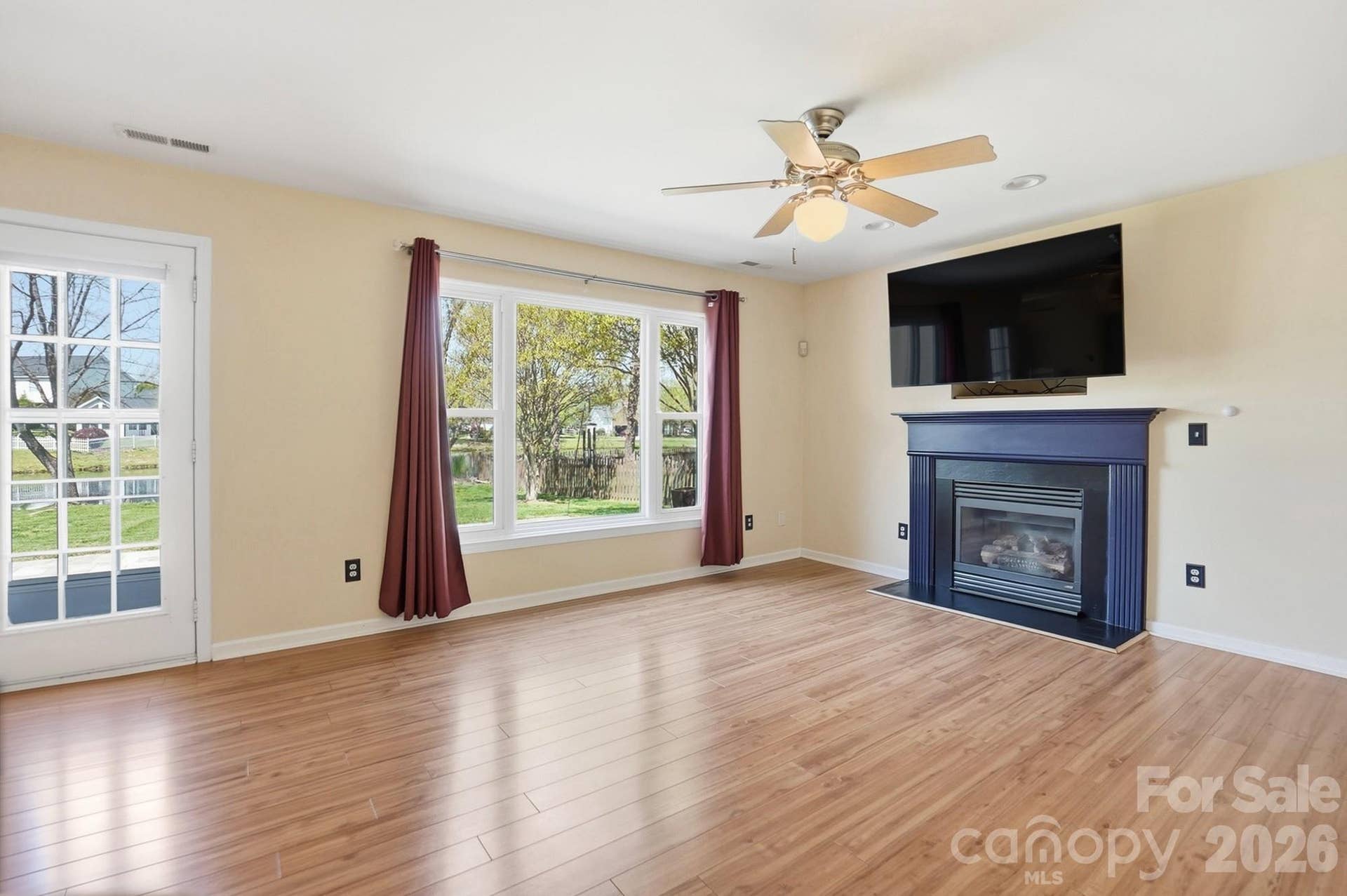 1009 Onotoa Drive, Indian Trail, NC 28079 Family room is at the back of the house and overlooks the pond