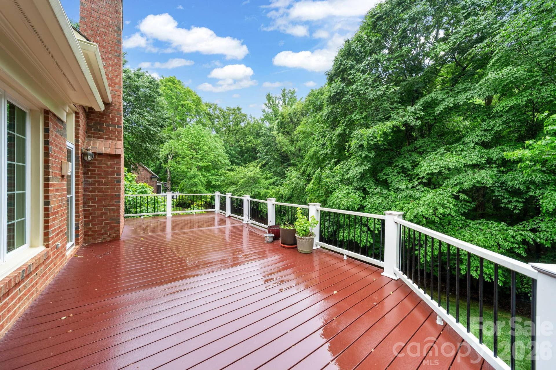 5215 Silchester Lane, Charlotte, NC 28215 Enjoy the serene backyard from the easy to maintain Trex composite deck