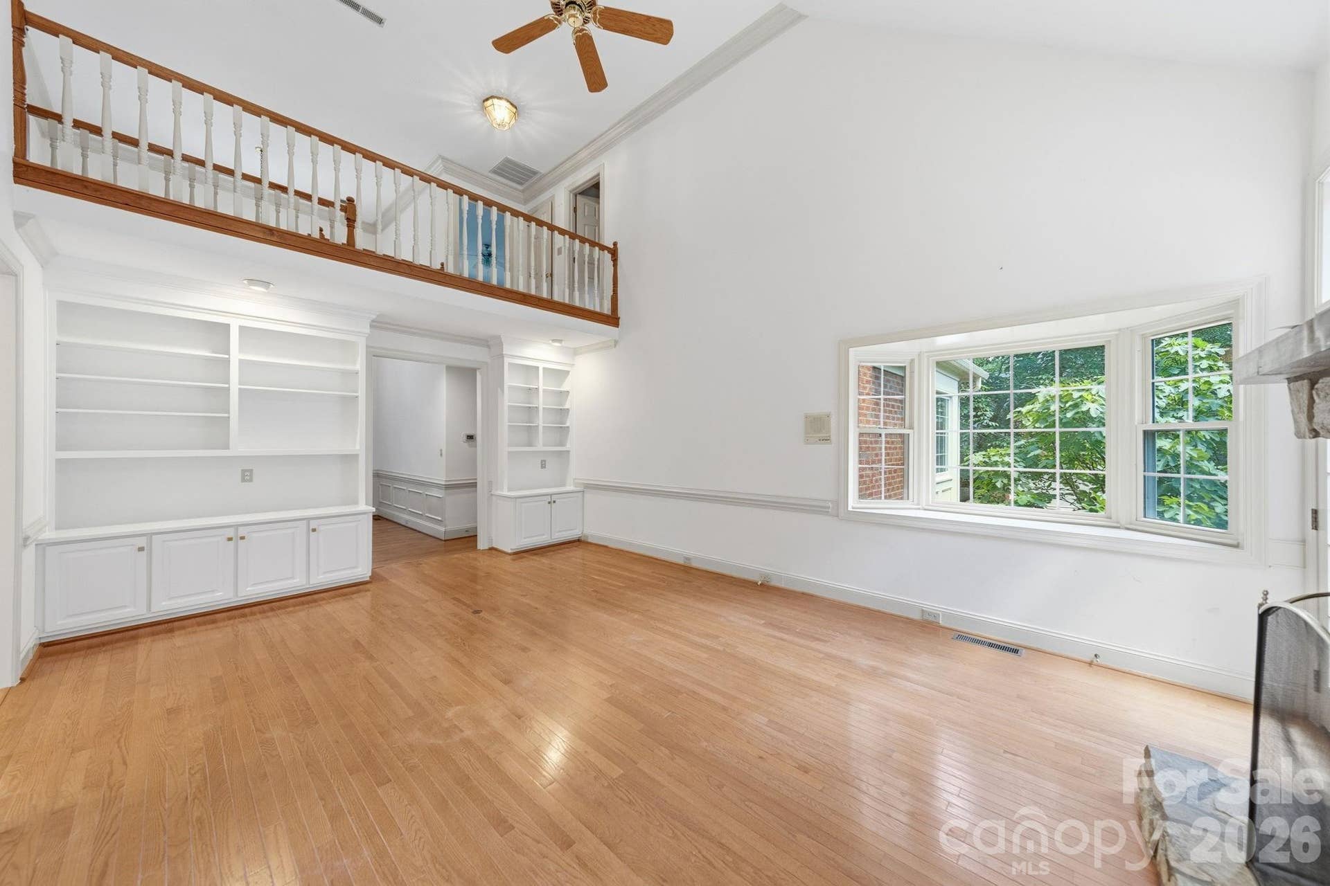 5215 Silchester Lane, Charlotte, NC 28215 Living room with freshly painted wood trim and built ins