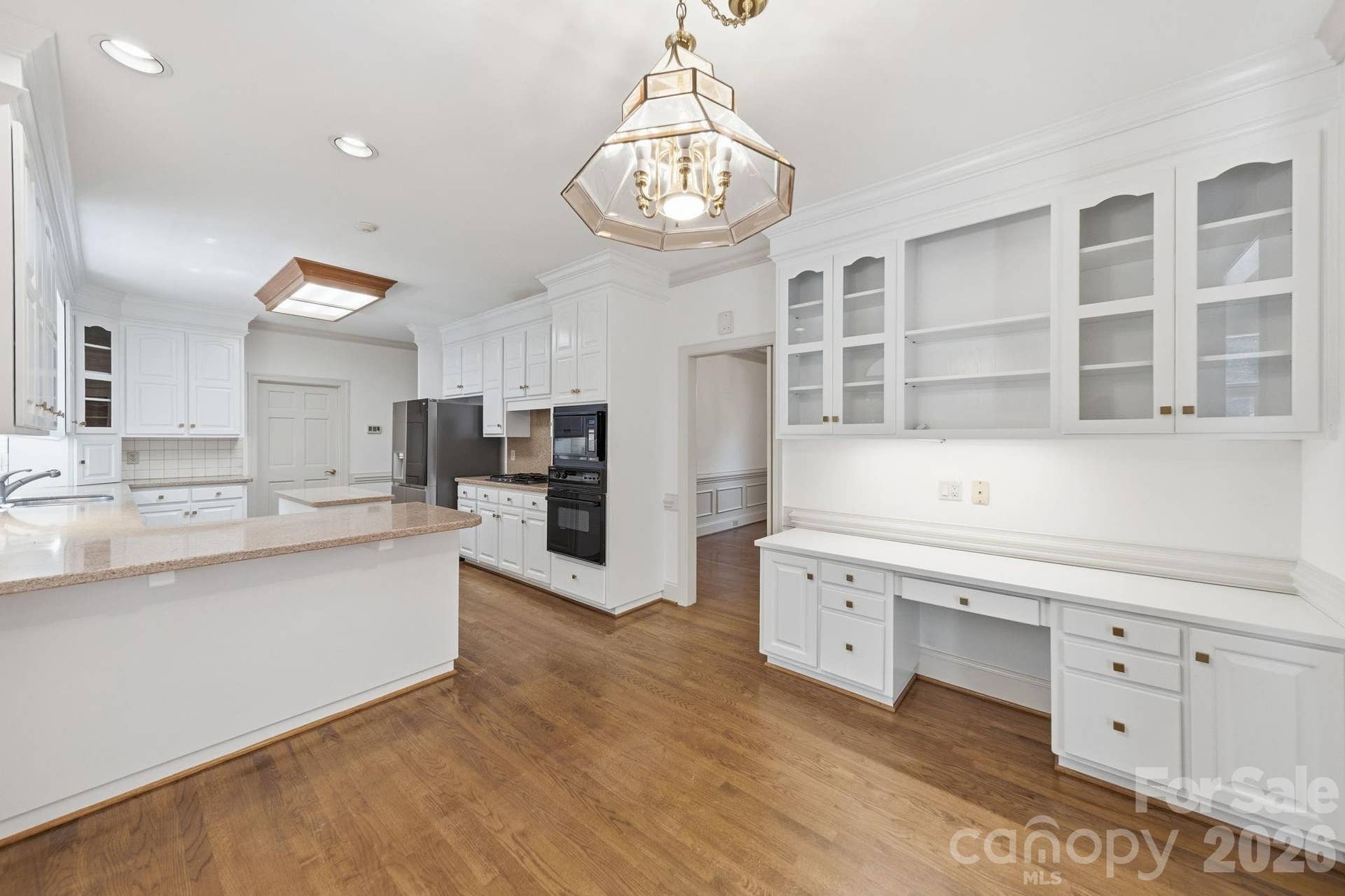 5215 Silchester Lane, Charlotte, NC 28215 Freshly painted cabinets with new modern knobs & pulls.