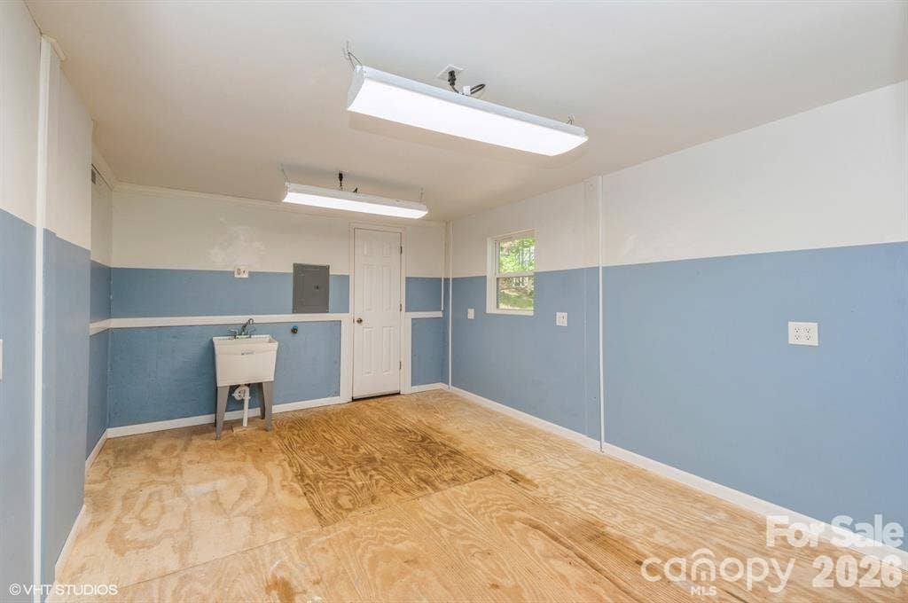 26030 Misty Way Drive, Tega Cay, SC 29708 Lower Deck storage room, game room, rec room etc!