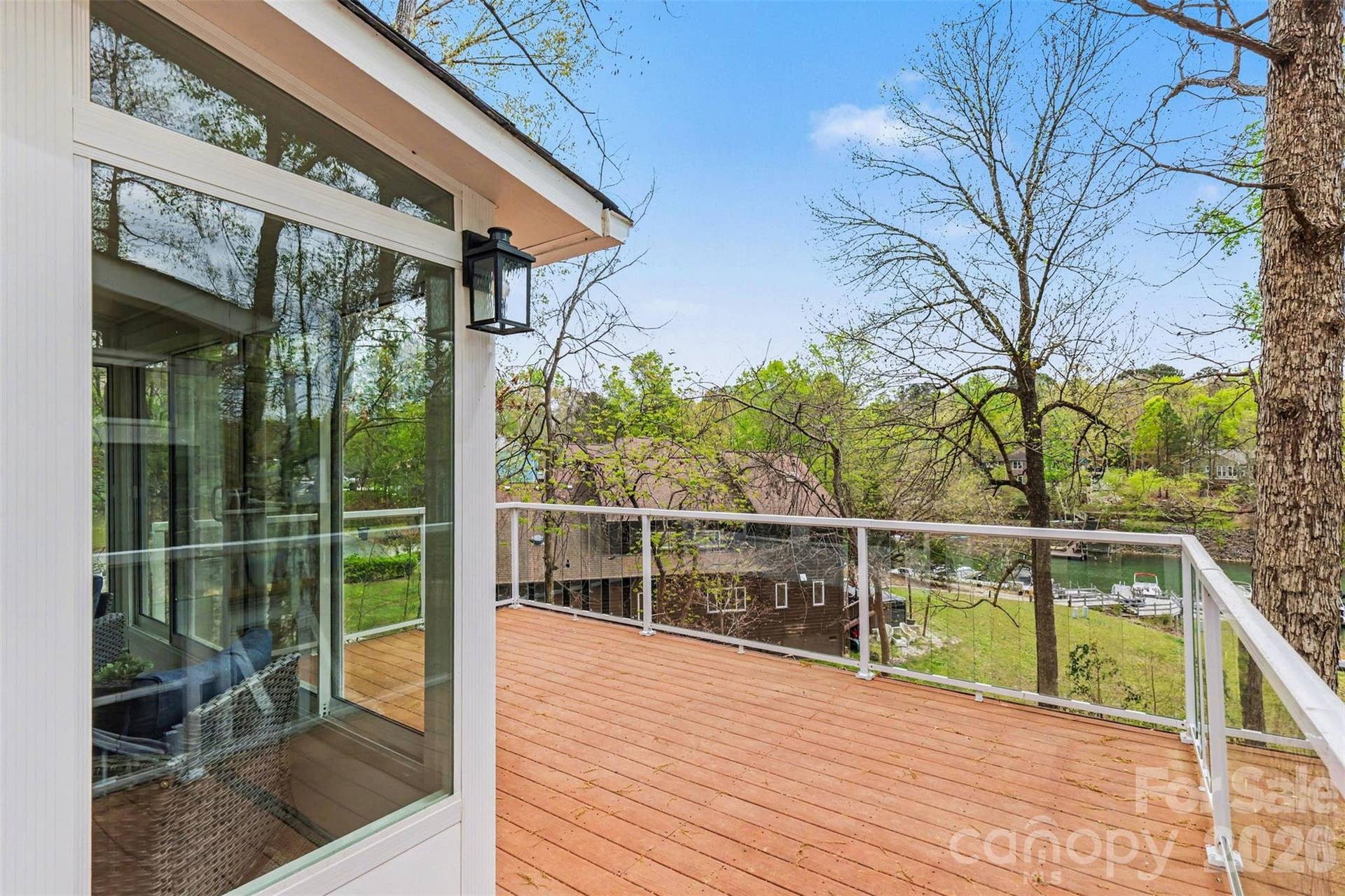 26030 Misty Way Drive, Tega Cay, SC 29708 Sunroom access to top porch with glass railing system for amazing views