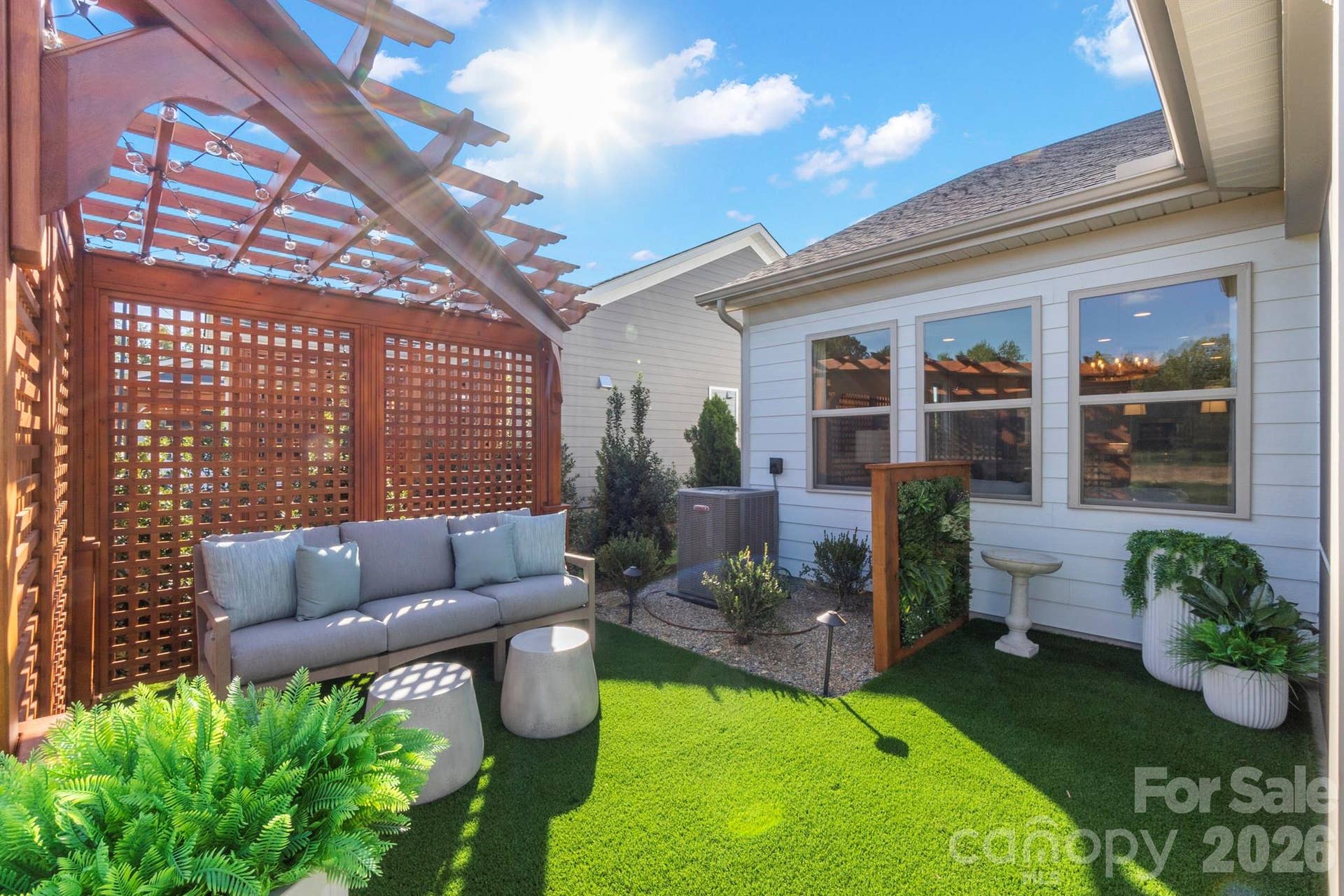 Outdoor pergola with seating area