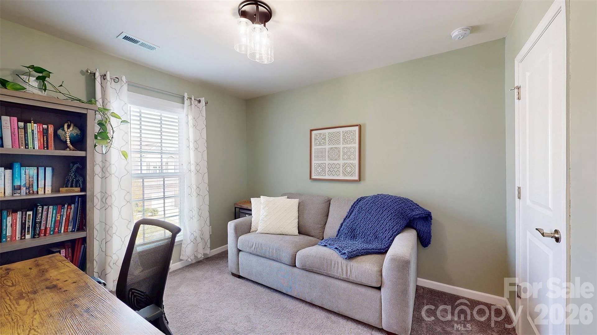 Secondary bedroom used as office.