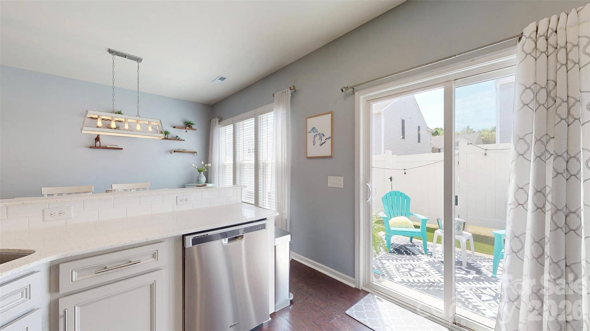 View of enclosed patio from kitchen.