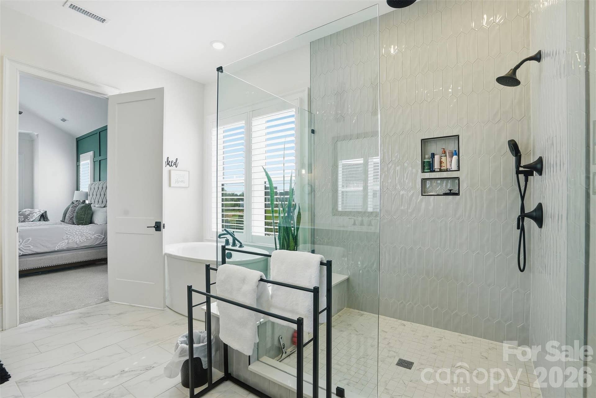 Large shower and freestanding tub
