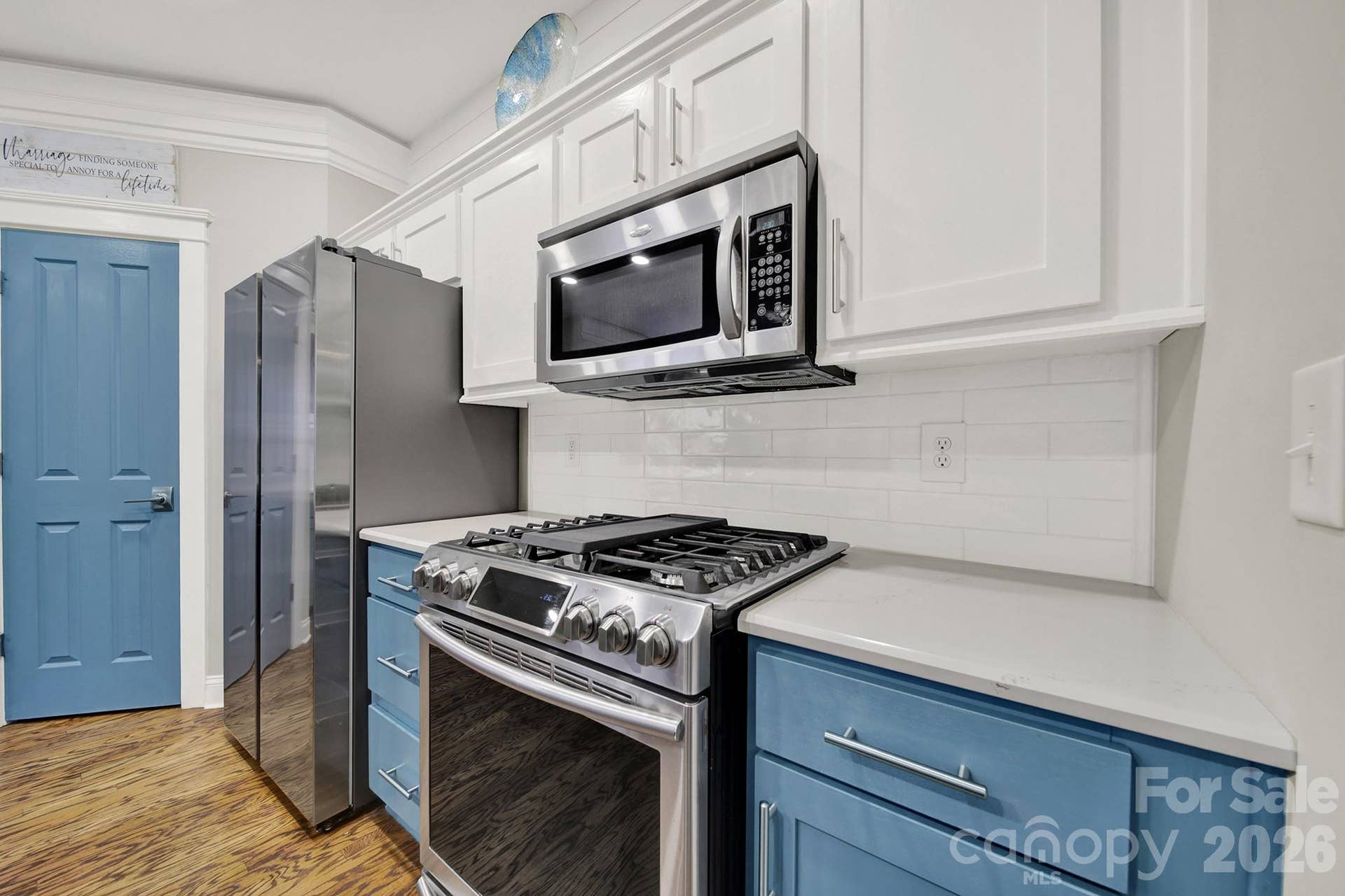 4214 Settler Heights Drive, Fort Mill, SC 29708 Kitchen with Quartz Countertops and Subway Backsplash