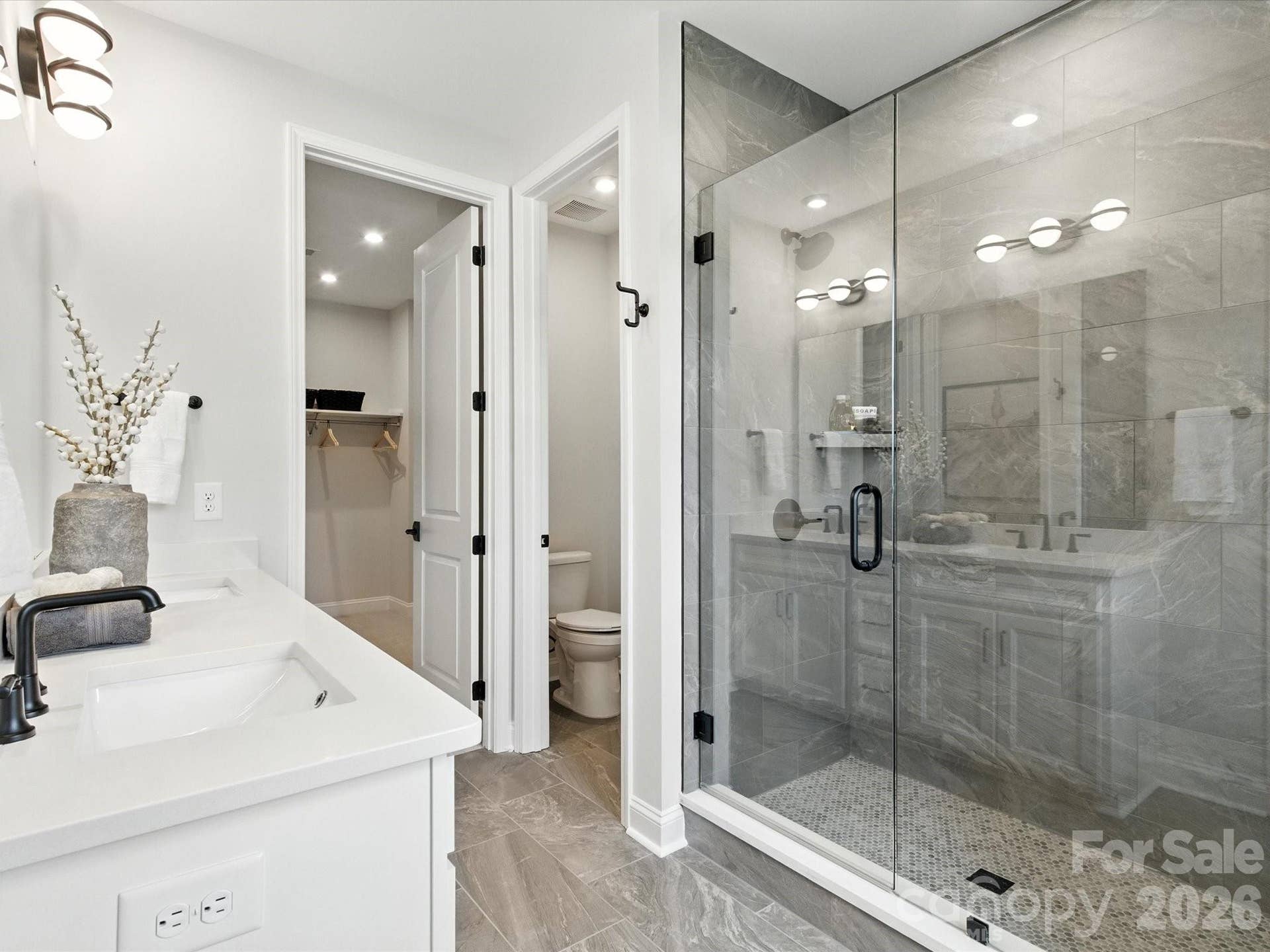 513 Nash Street, Fort Mill, SC 29715 Dual vanity primary bathroom with tiled walk-in shower