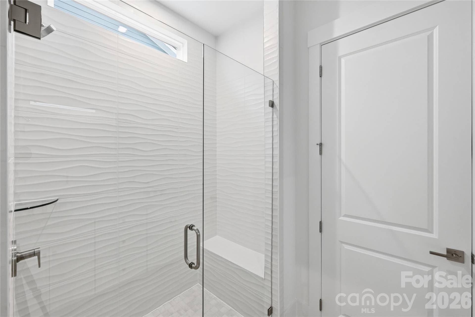 3671 Blue Pine Drive, #177, Indian Land, SC 29707 Inviting primary bath offering a private oasis in the home.