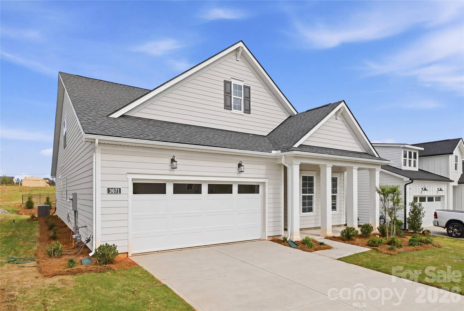 3671 Blue Pine Drive, #177, Indian Land, SC 29707 Timeless Low Country style architecture welcomes you home!