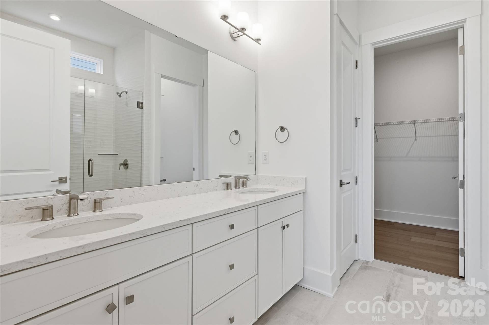 3671 Blue Pine Drive, #177, Indian Land, SC 29707 Relaxing primary bath with dual vanities for shared morning routines.