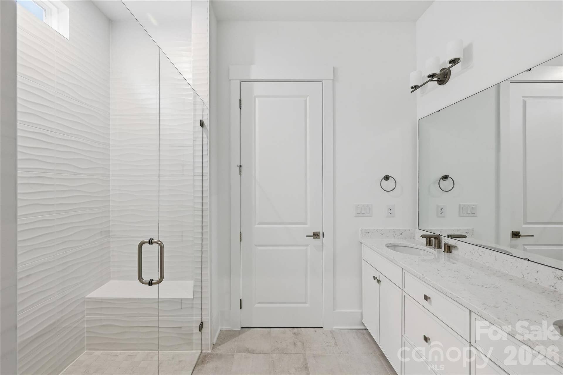 3671 Blue Pine Drive, #177, Indian Land, SC 29707 Relaxing primary bath with dual vanities for shared morning routines.
