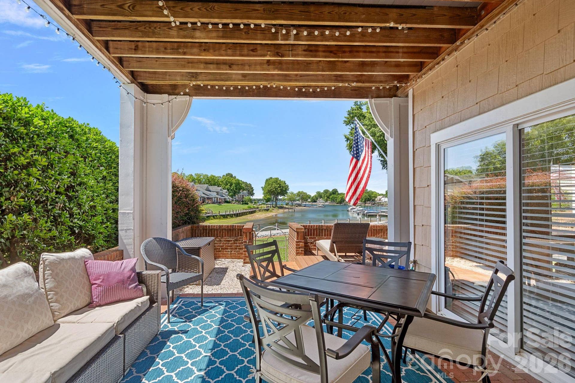 Relax, entertain, and enjoy the views from your private patio featuring a covered portion and a sunning area. The patio can be accessed from the great room or the primary bedroom.