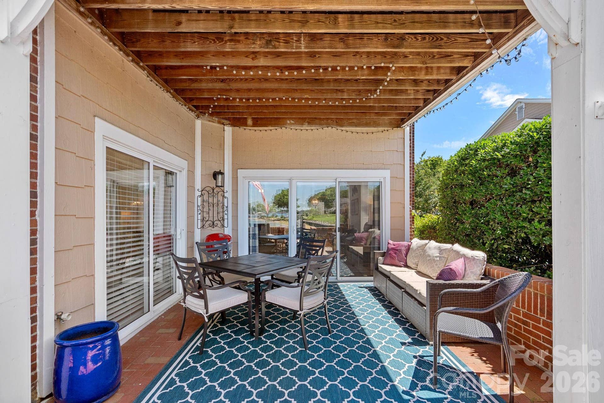 Relax, entertain, and enjoy the views from your private patio featuring a covered portion and a sunning area. The patio can be accessed from the great room or the primary bedroom.