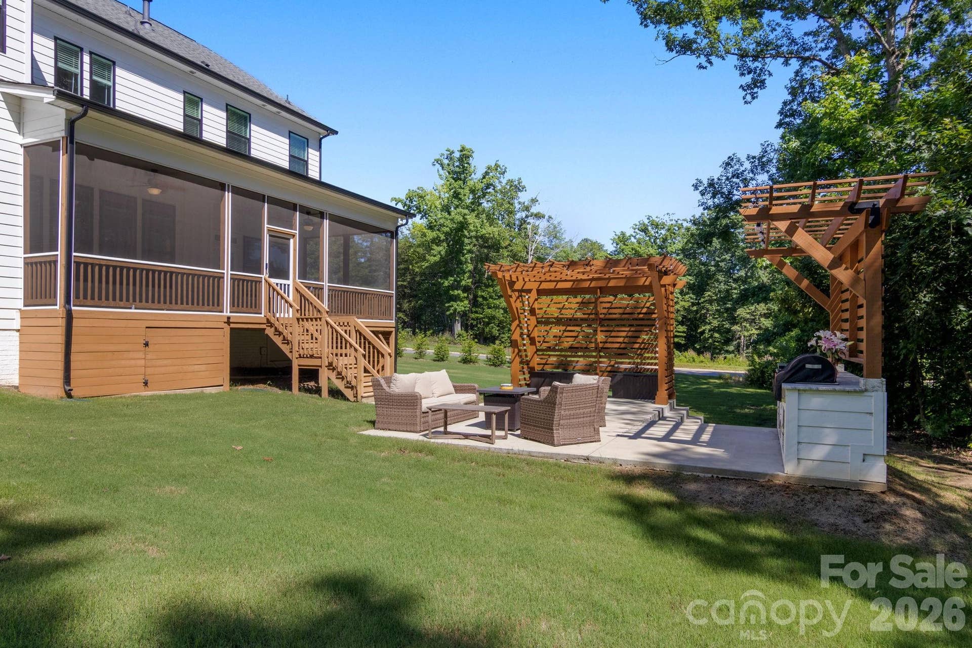 Grilling station/Extended patio/Screened in backporch view