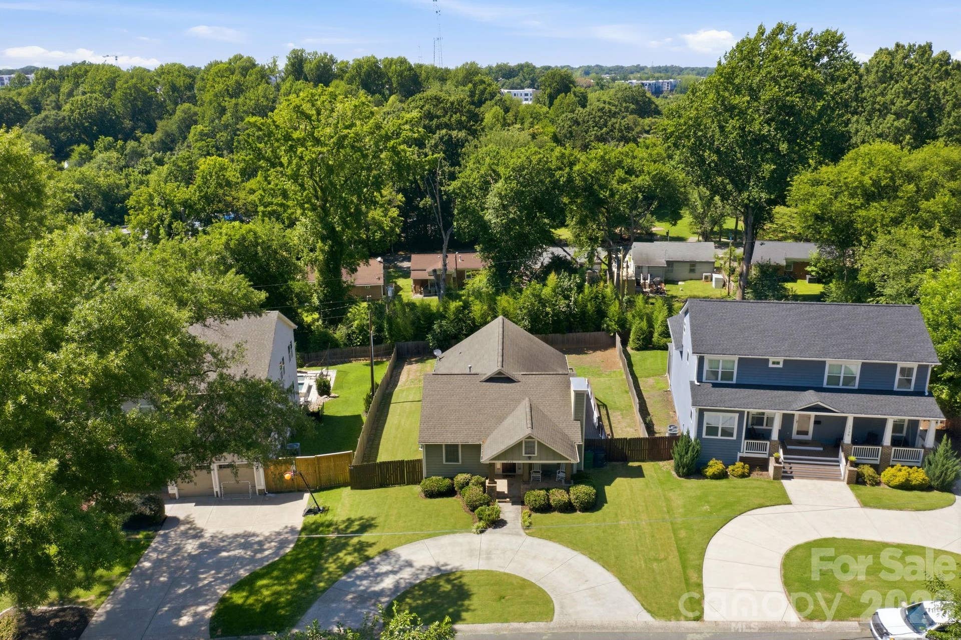 Great look at home with trees surrounding