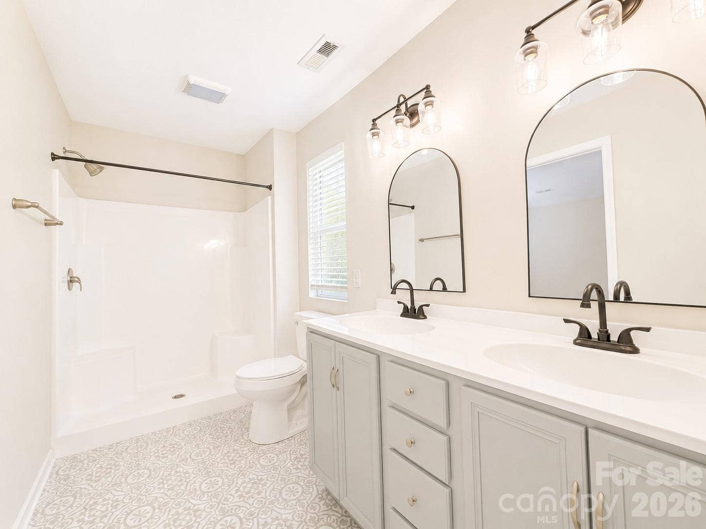 115 High Bluff Circle, Mooresville, NC 28115 Primary Bath Updated with Walk-in Shower, Dual Vanity, Tile Floors & Large Walk-in Closet