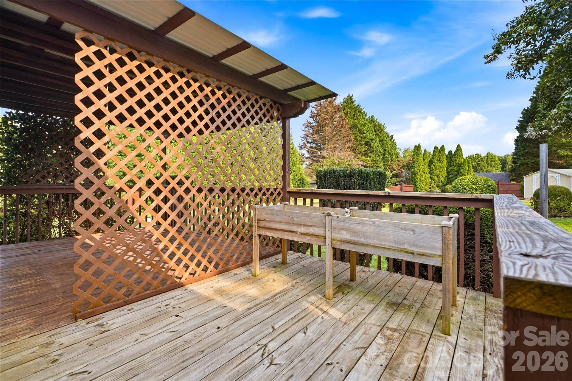 3892 Stoney Creek Drive, Lincolnton, NC 28092 Grilling area and raised herb garden create a functional outdoor entertaining space.