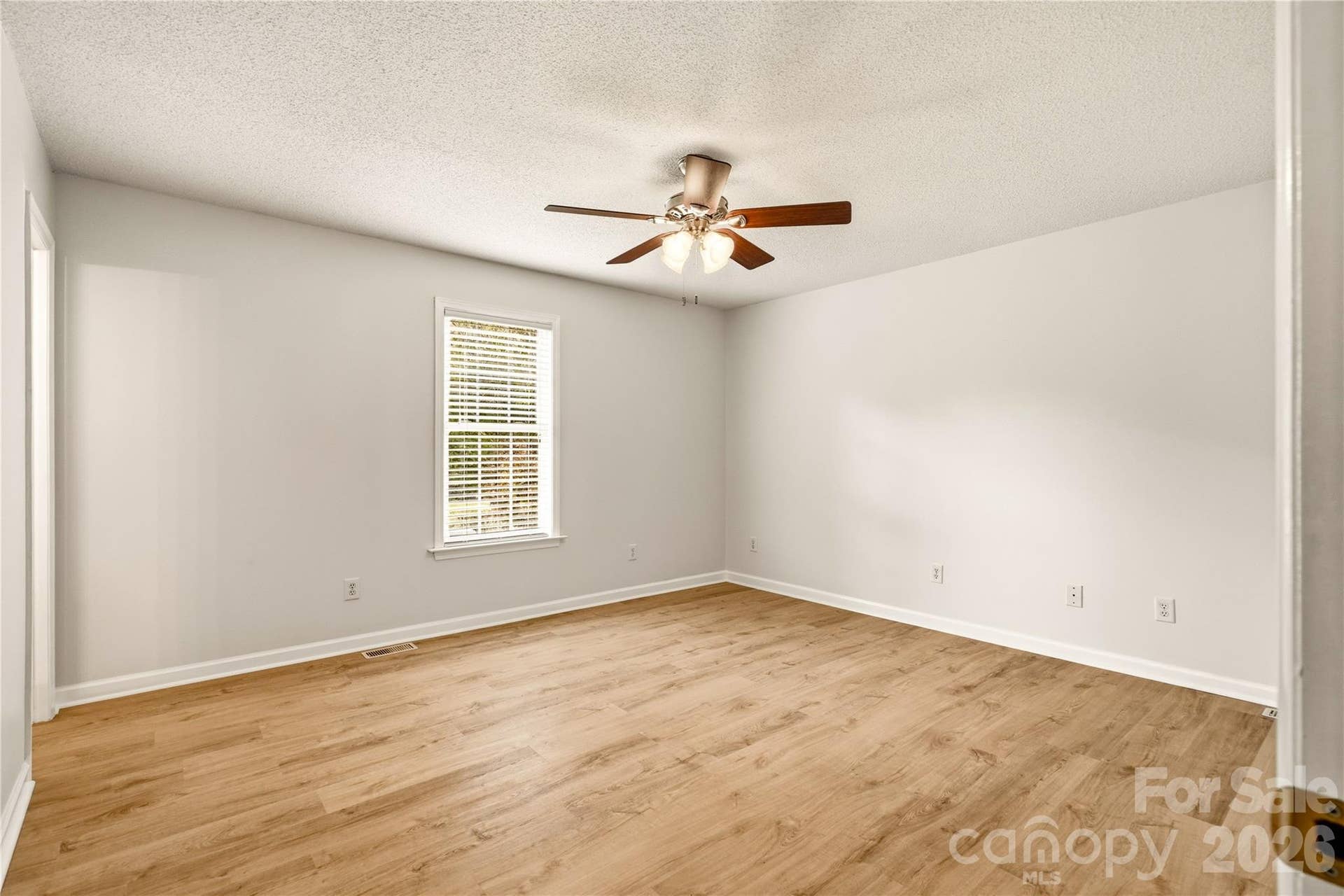 3892 Stoney Creek Drive, Lincolnton, NC 28092 Spacious primary suite offering a private retreat with an ensuite bath.
