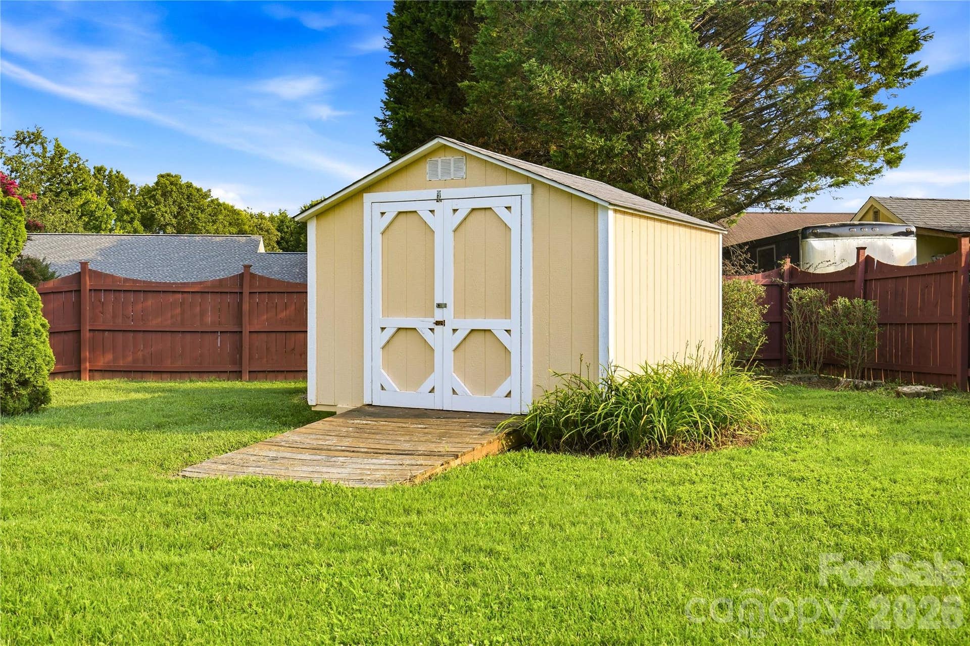 3892 Stoney Creek Drive, Lincolnton, NC 28092 10' x 12' storage shed provides additional space for tools, lawn equipment, or hobbies.