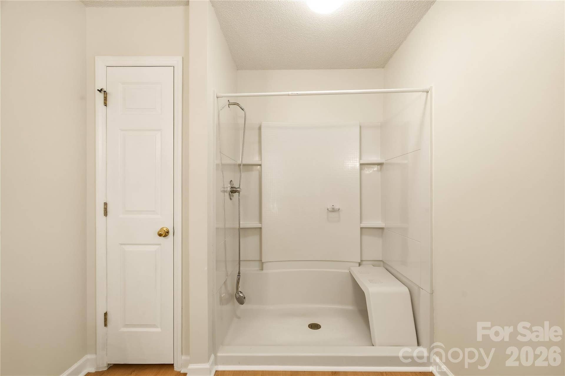 3892 Stoney Creek Drive, Lincolnton, NC 28092 Walk-in shower with convenient seating.