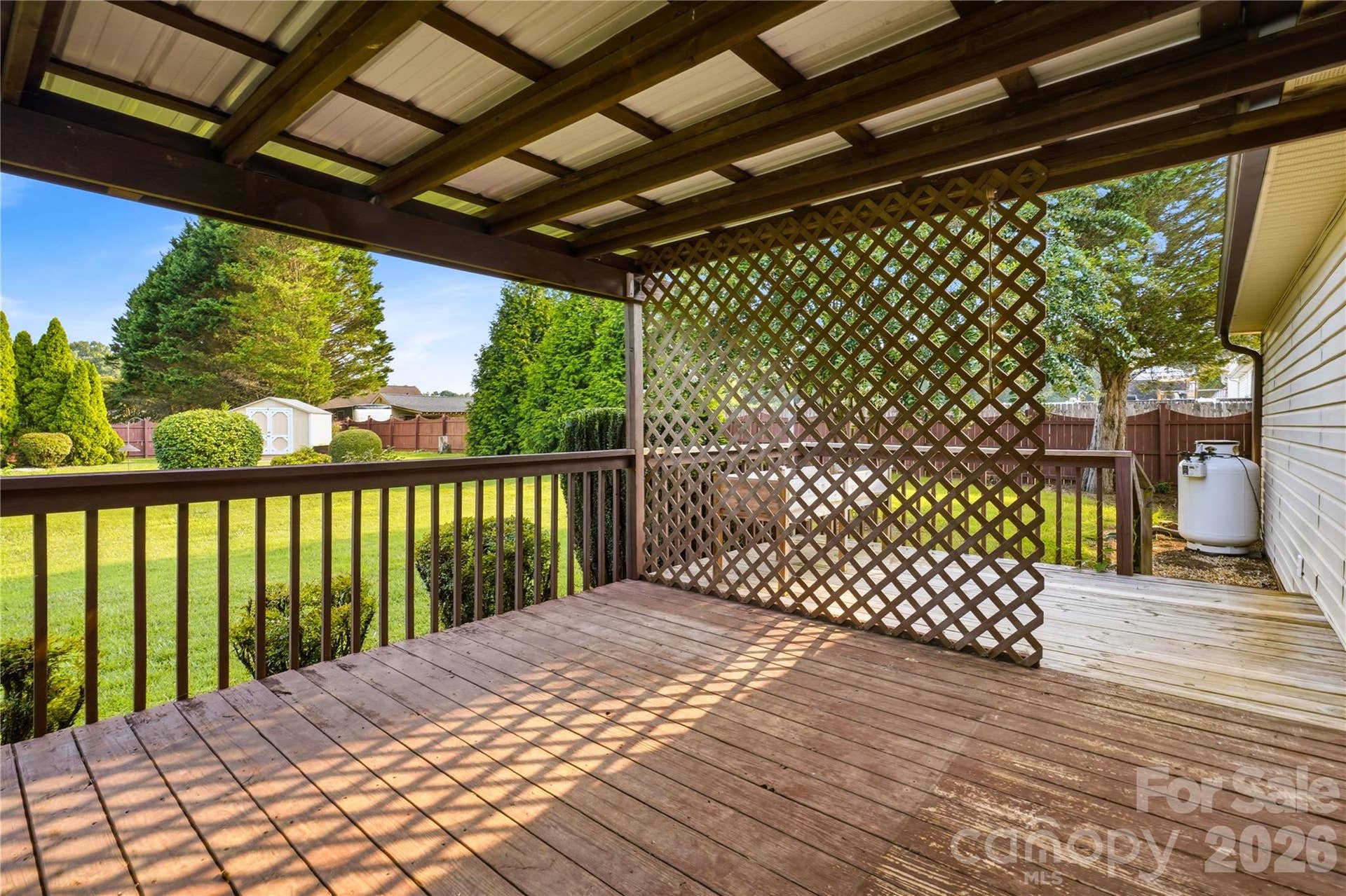 3892 Stoney Creek Drive, Lincolnton, NC 28092 Covered deck creating the perfect extension of the home's living space.