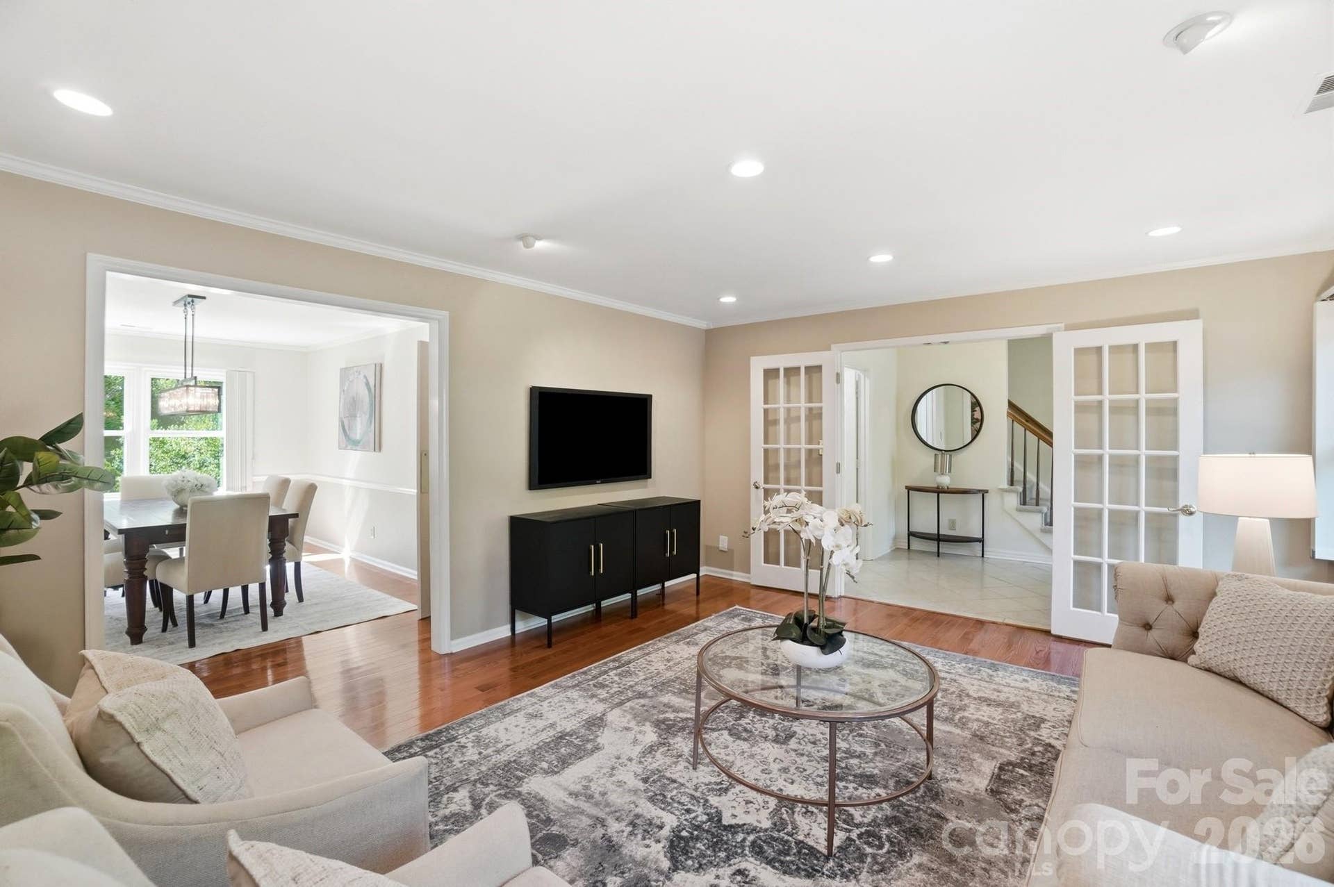 Living Room w/French Doors for Privacy, Entry to Dining Room