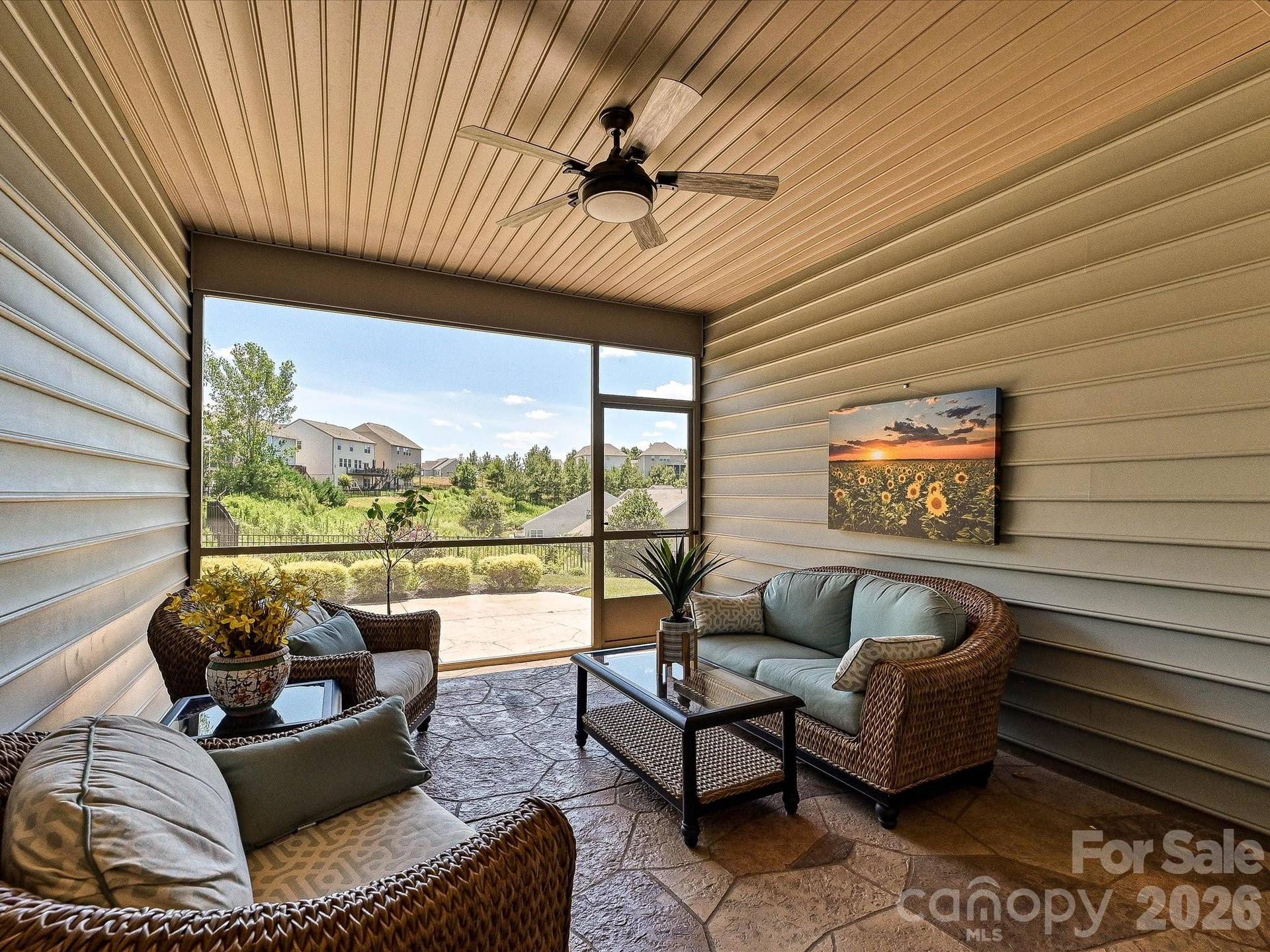 Screened porch with ceiling fan