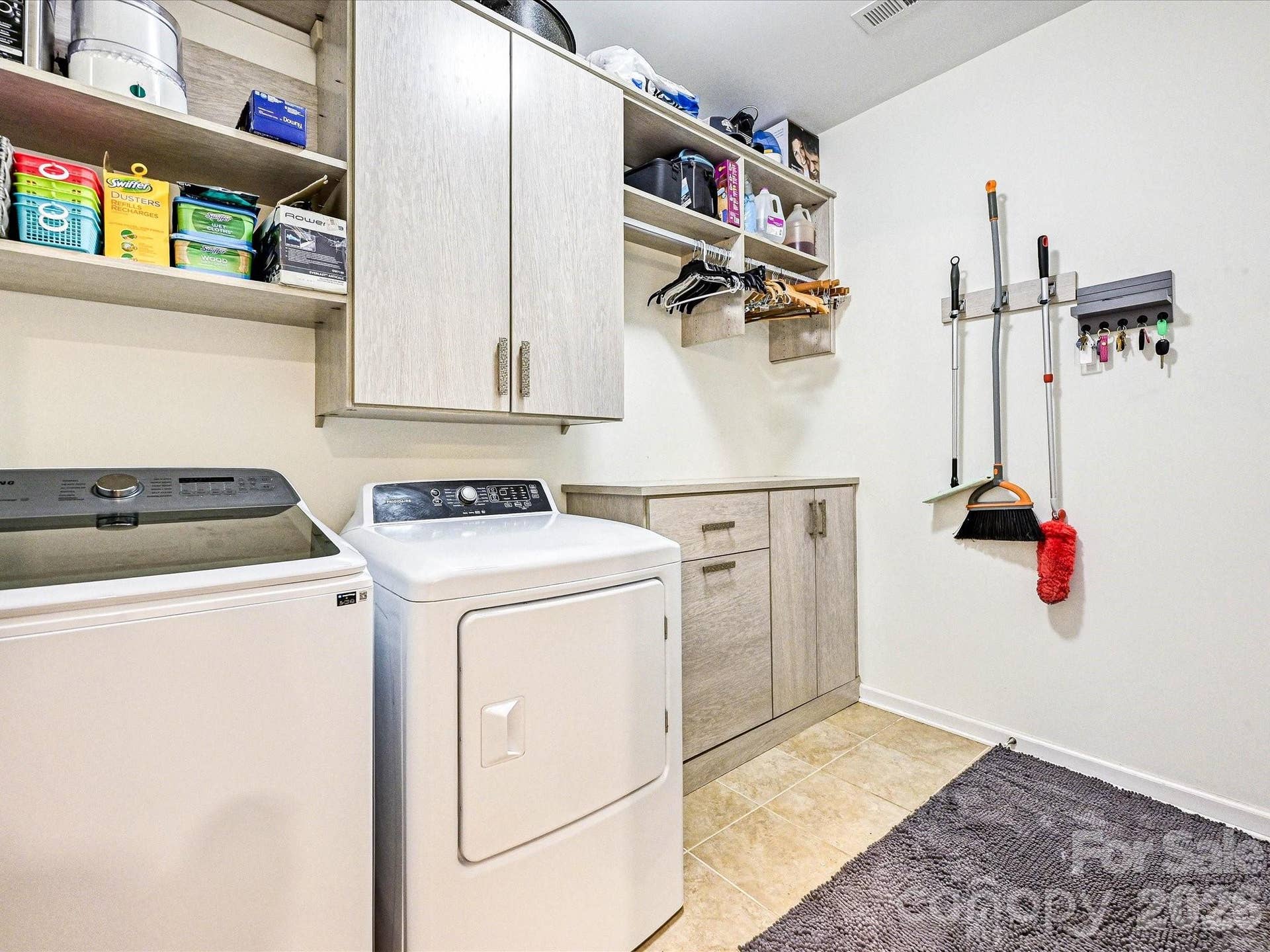 Laundry room with custom cabinets