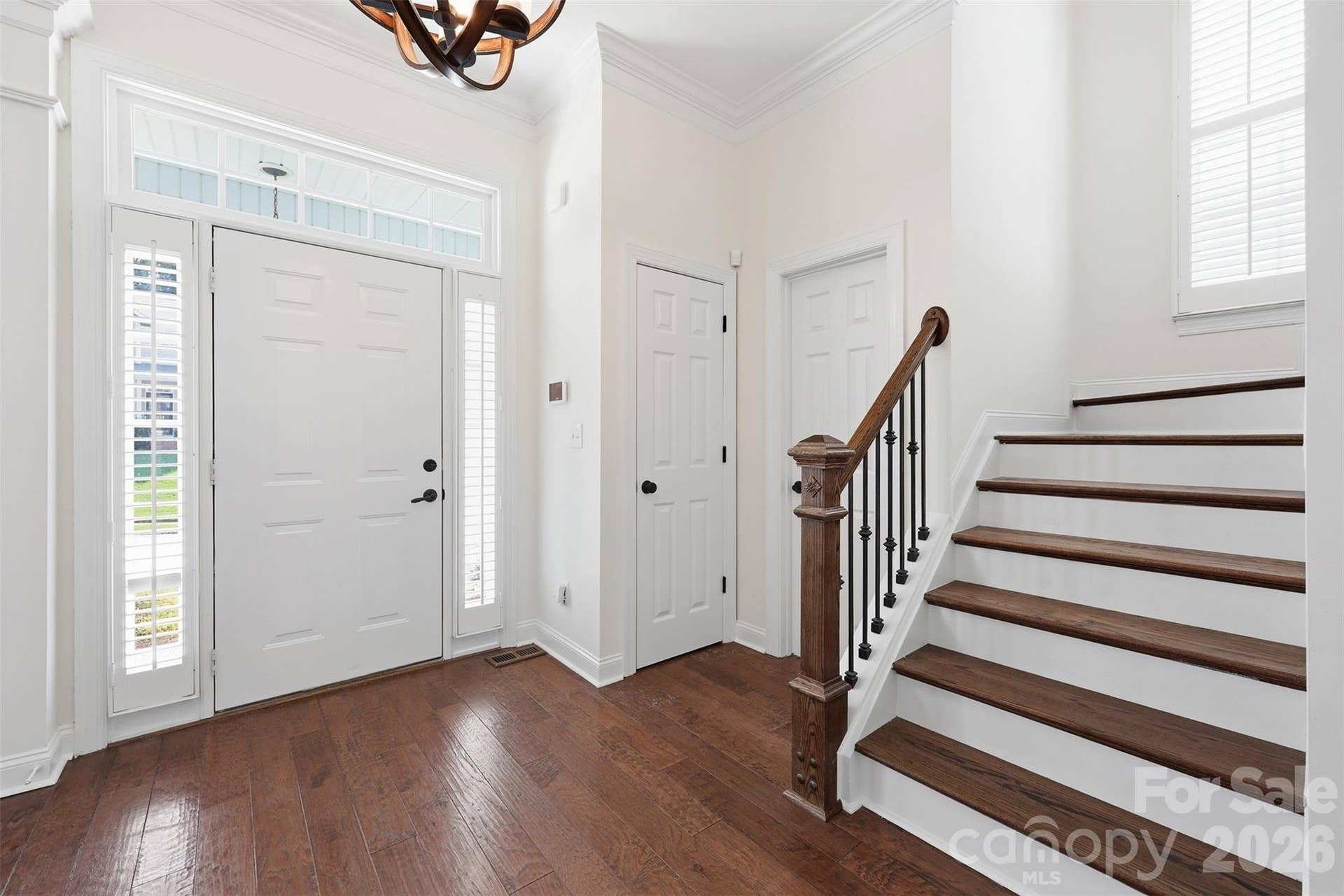 6832 Charter Hills Road, Charlotte, NC 28277 Stunning staircase featuring wood treads and elegant iron spindles!