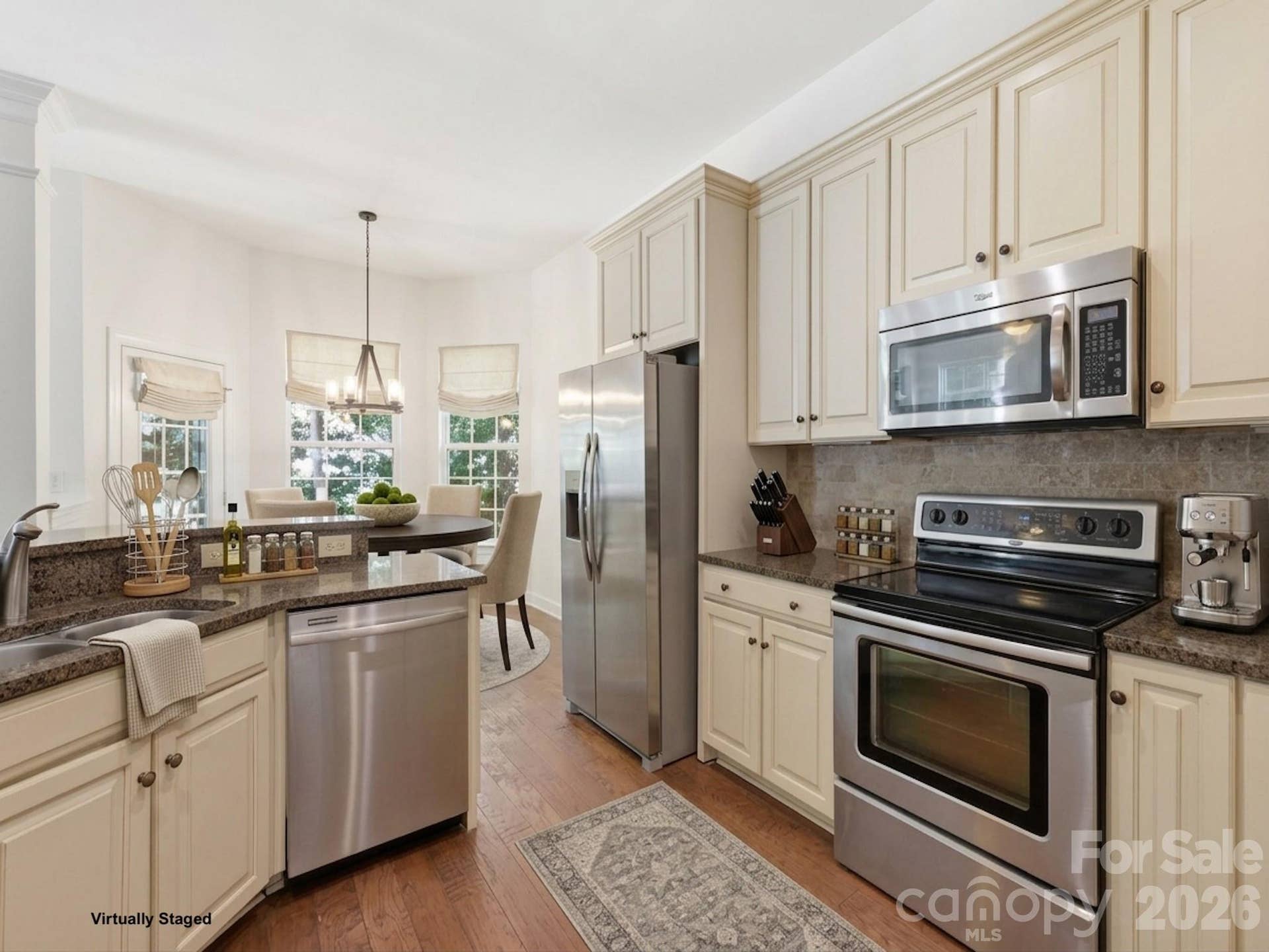 6832 Charter Hills Road, Charlotte, NC 28277 Stainless steel appliances, rich granite countertops, a tumbled marble backsplash!