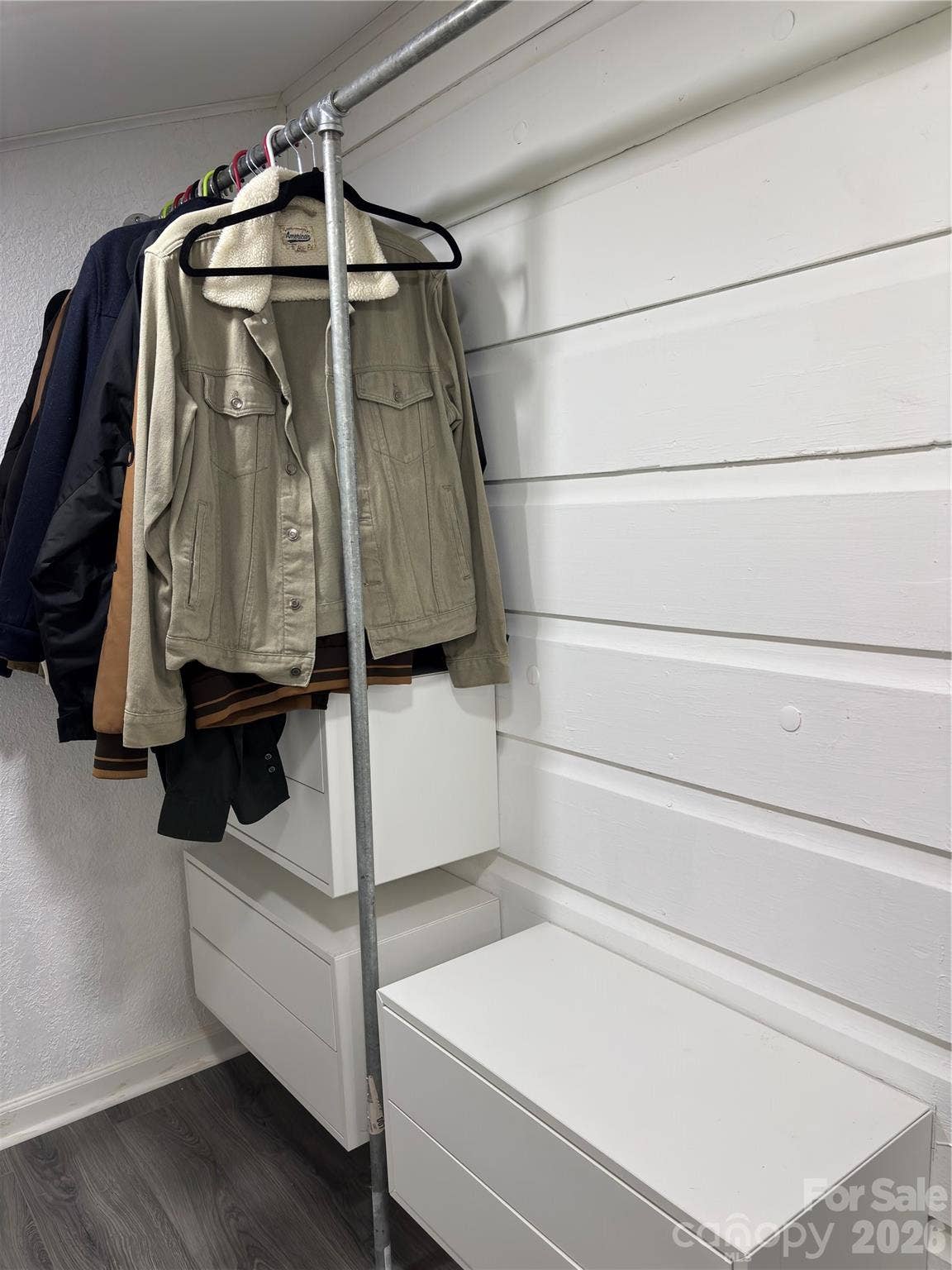 Closet with window and new cabinets