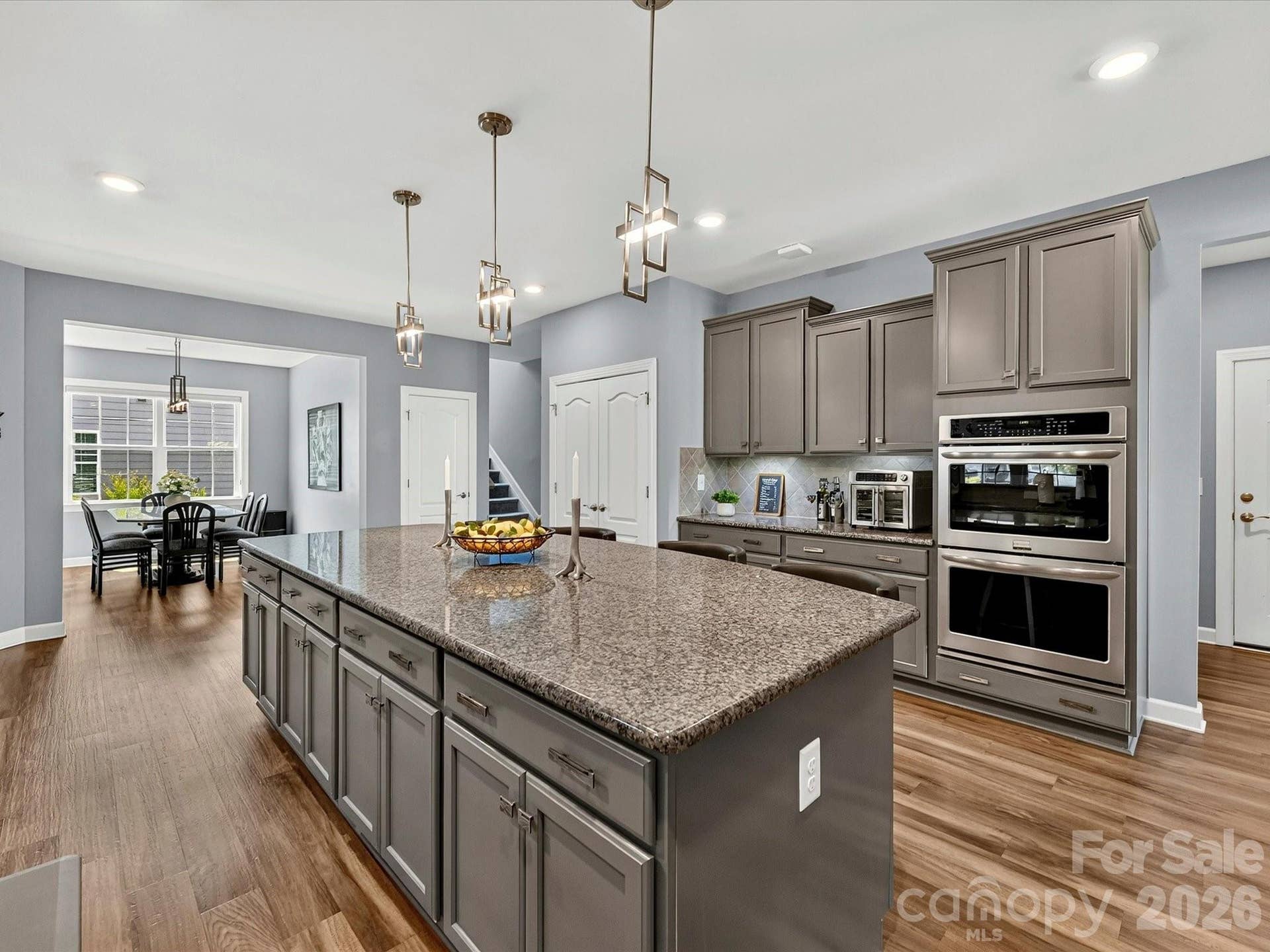 Built-in Wall Ovens. Kitchen has easy access to Breakfast Room, Great Room, Dining Room and Mud Room