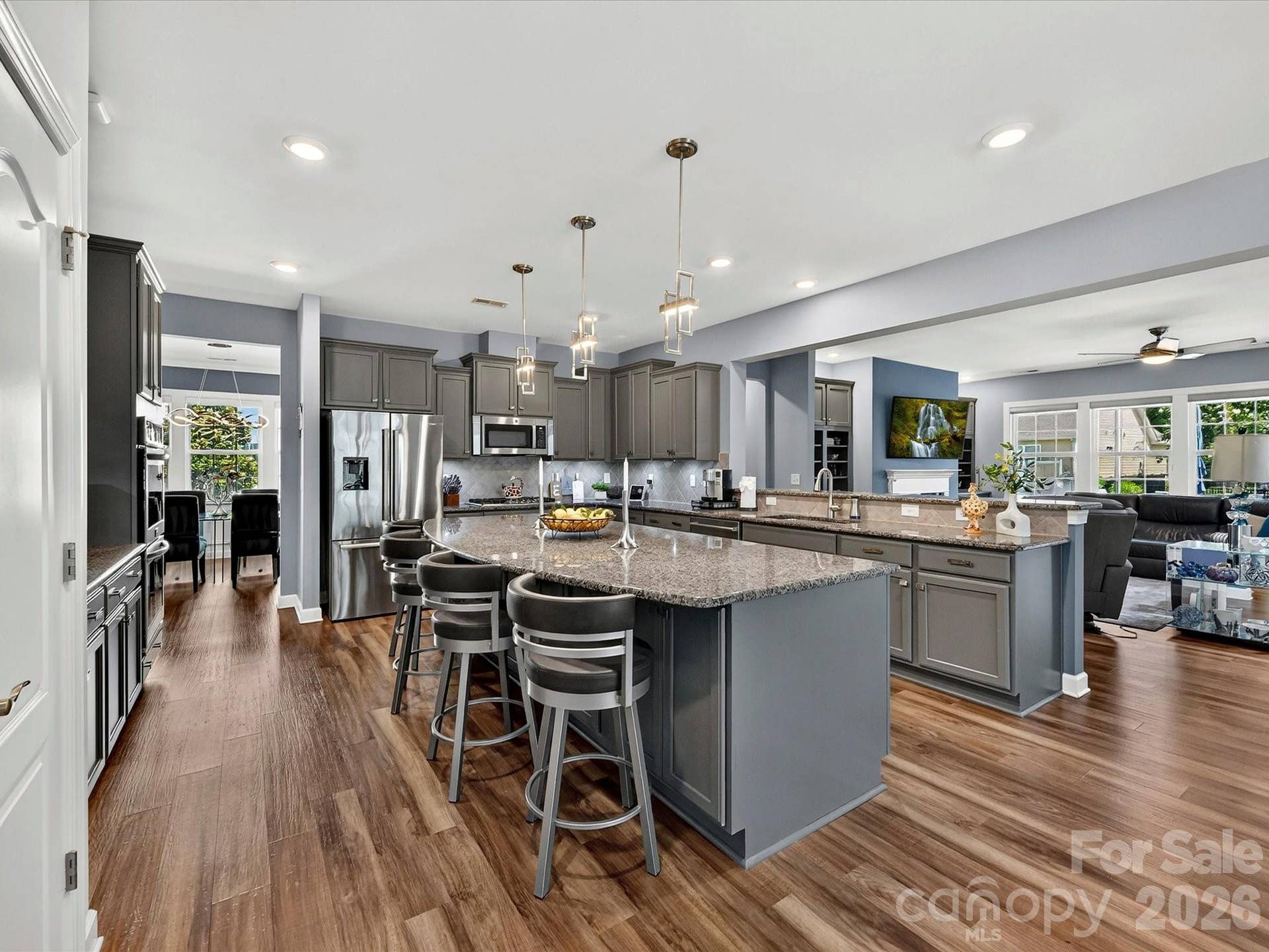 Large Kitchen with Ample Cabinet Storage, Roll Out Shelving, Granite Counters, LVP Flooring