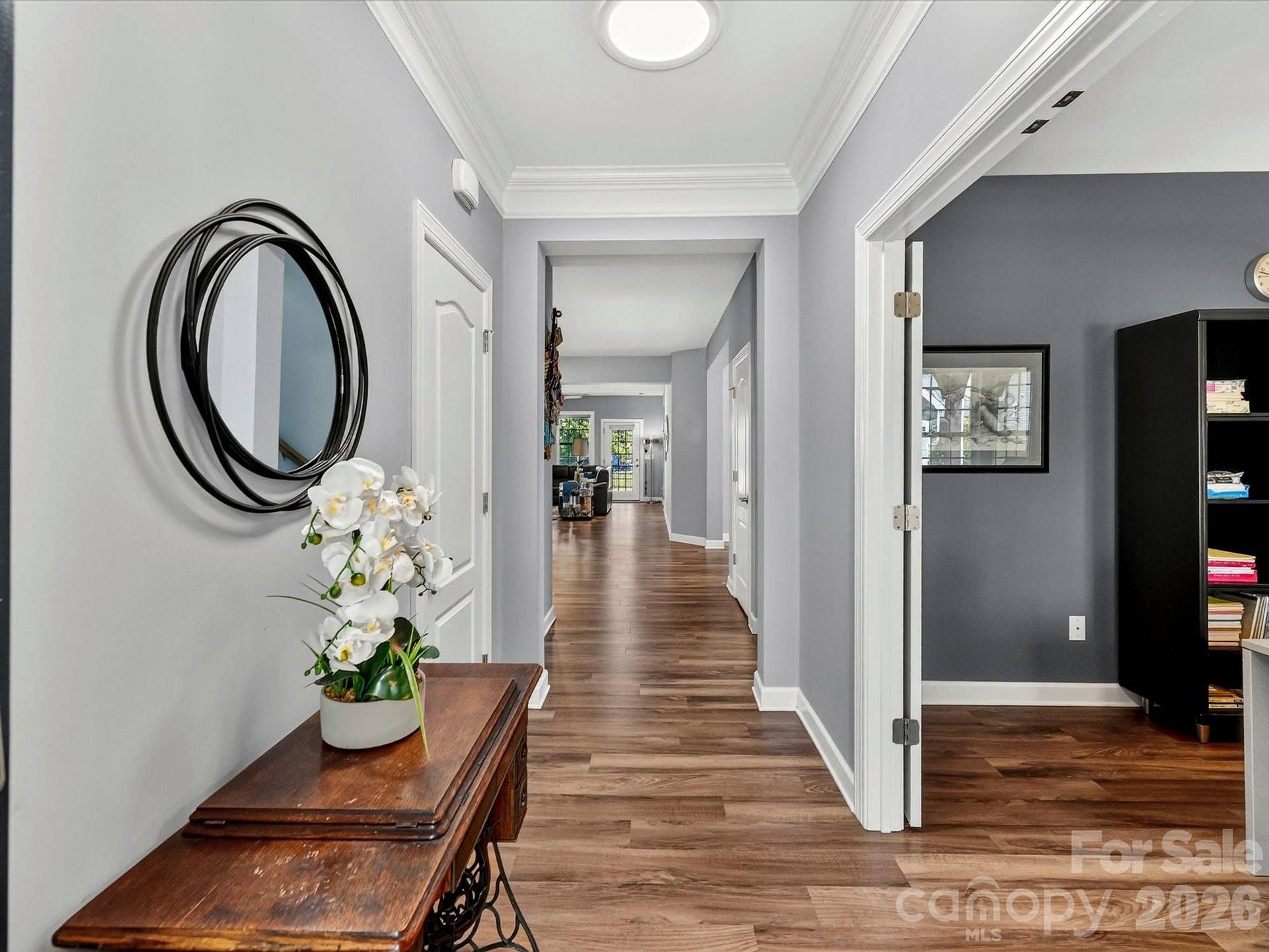 Foyer with Crown Moldings and LVP durable Flooring