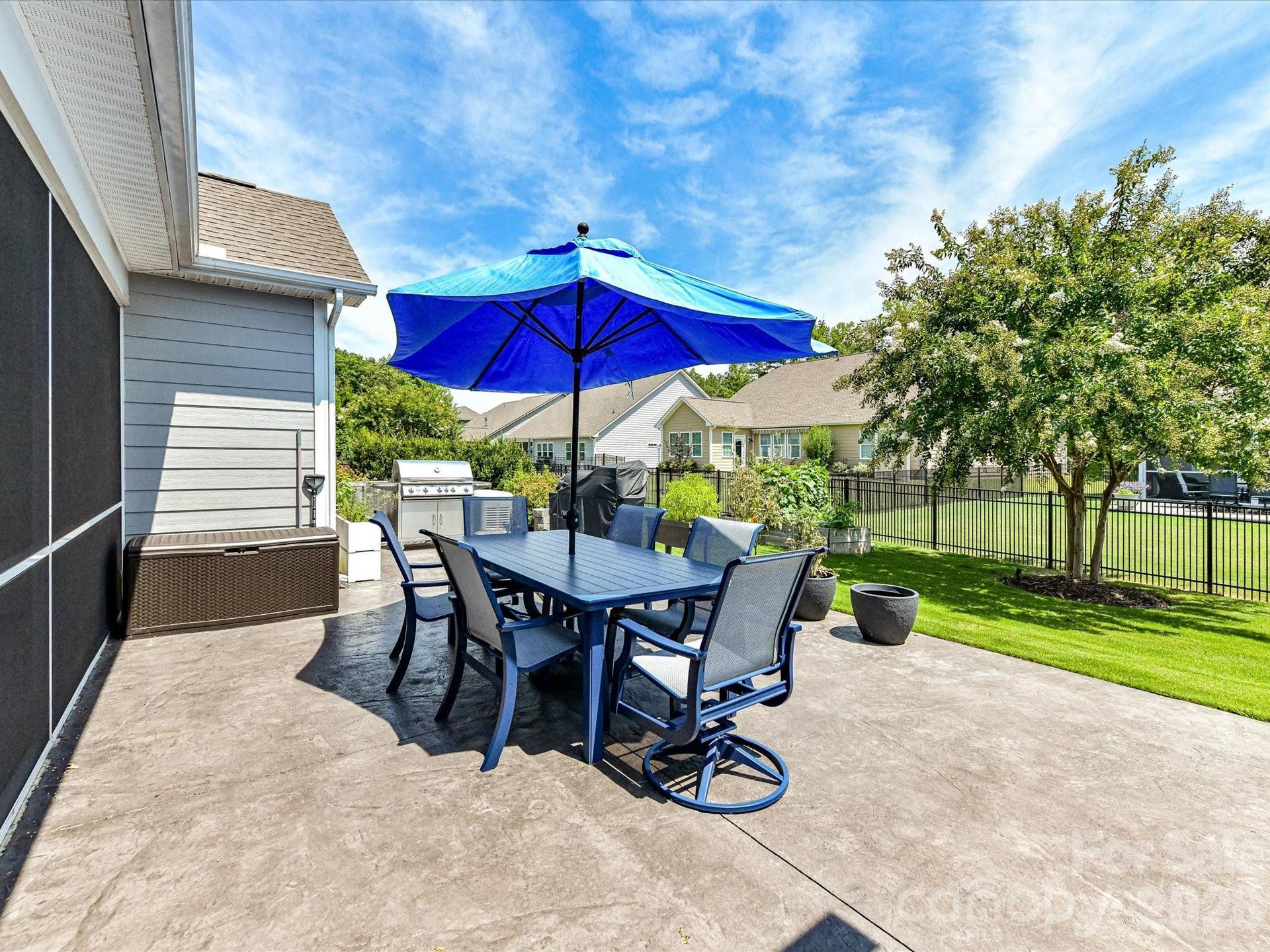 Large Patio with Landscaping Views. Generac Generator to Remain. Gas Line to Grill.