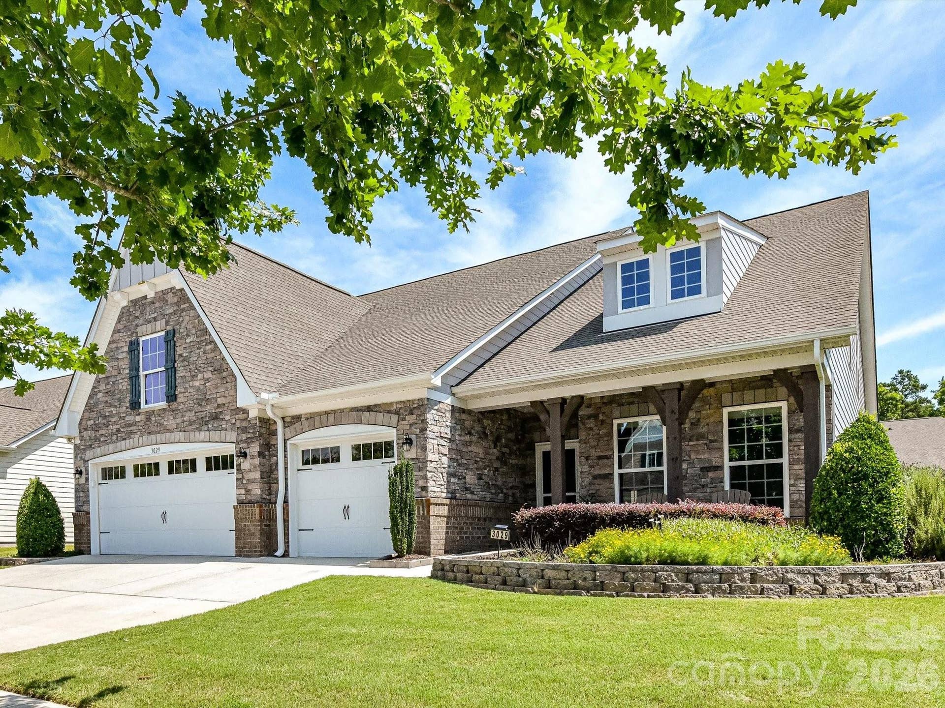 Beautiful Landscaping with Stone Edging. Bermuda Sod entire Yard