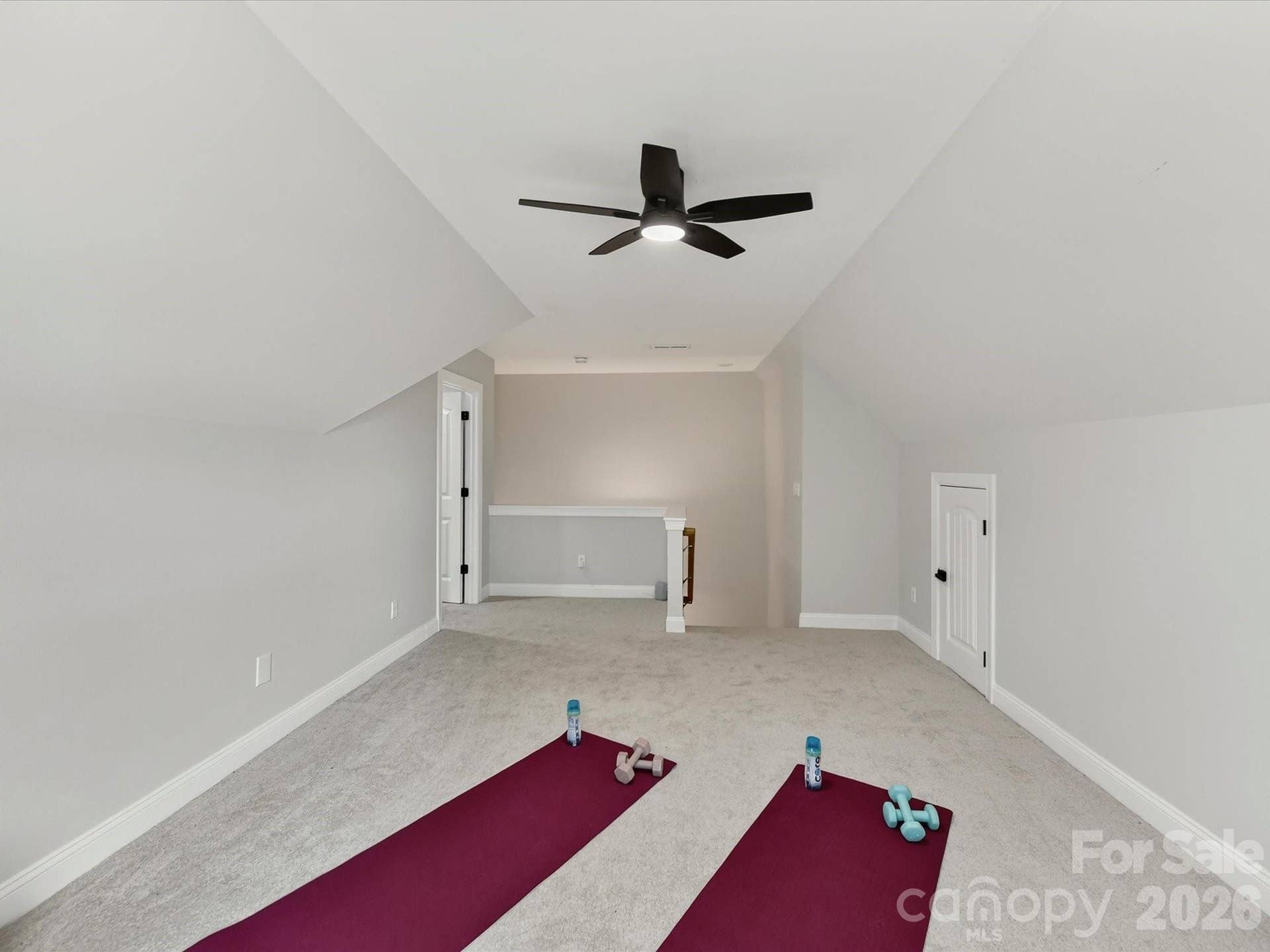 The spacious bonus room offers endless flexibility as a media room, game room, fitness studio, playroom, or private guest retreat.