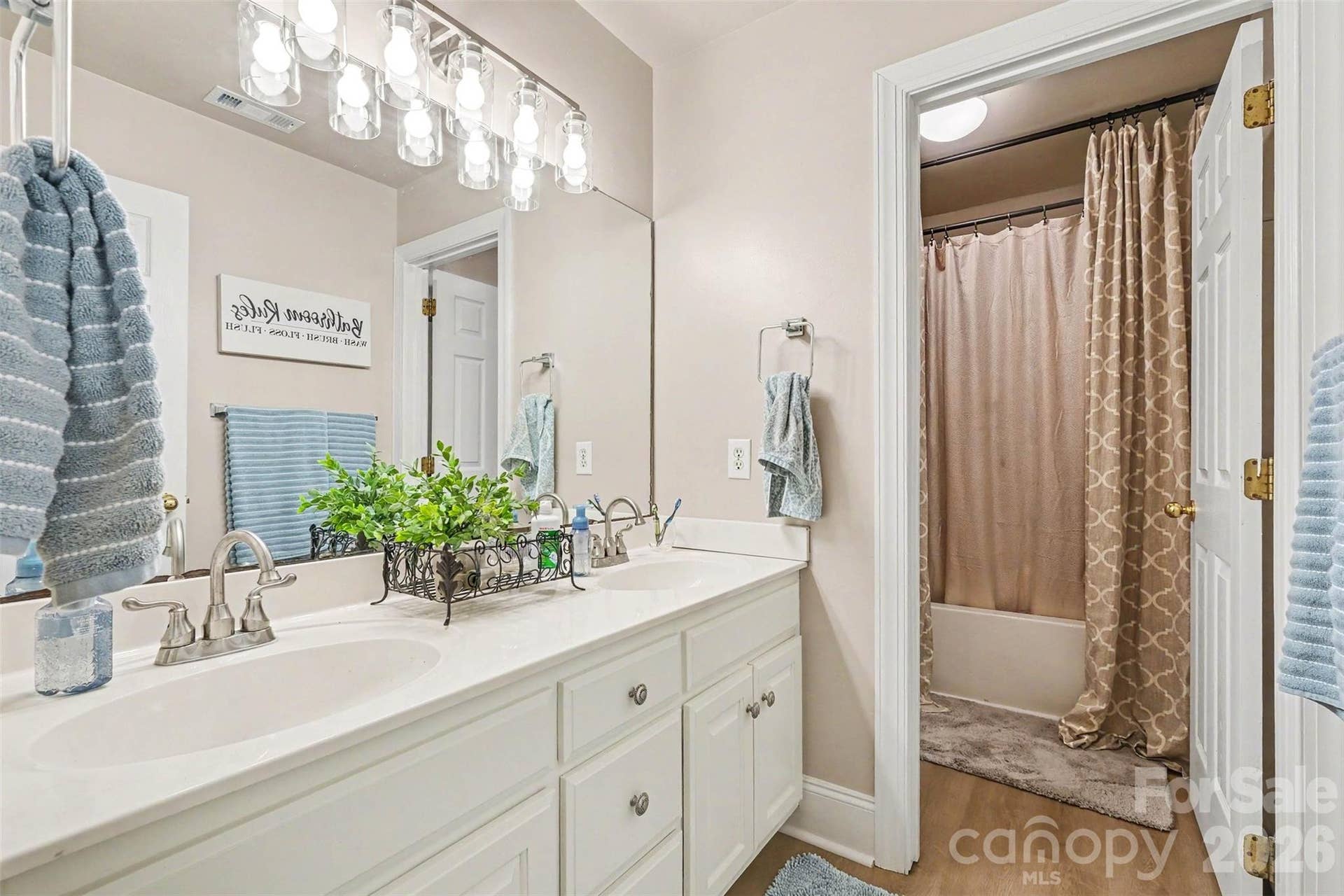 Shared upstairs bathroom with new flooring