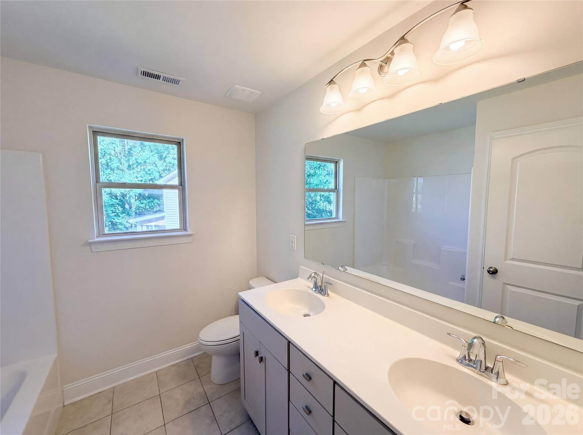 primary bathroom with water closet