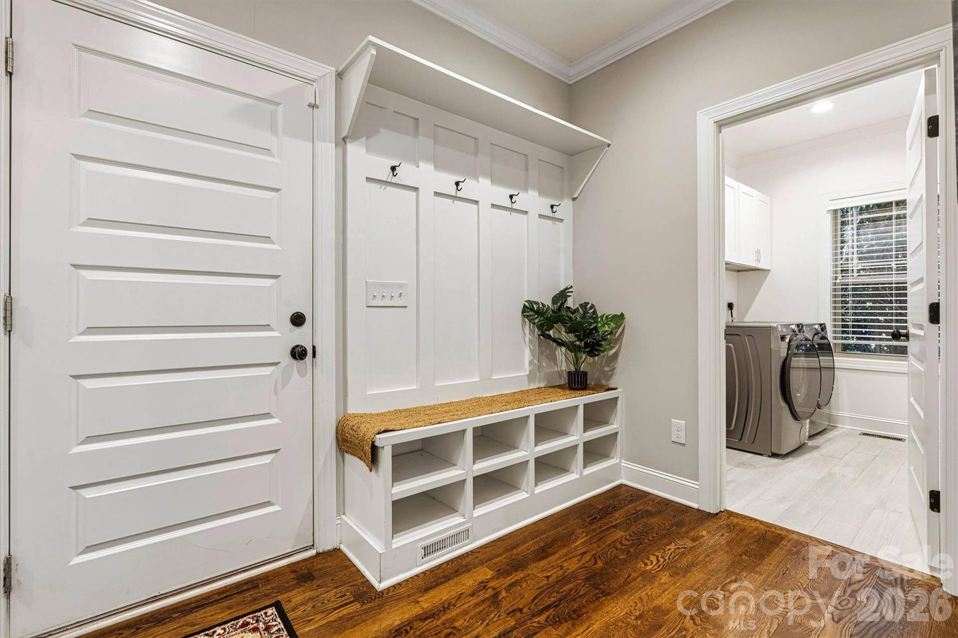 Drop zone and laundry room right off the garage area for easy access and to keep everything organized