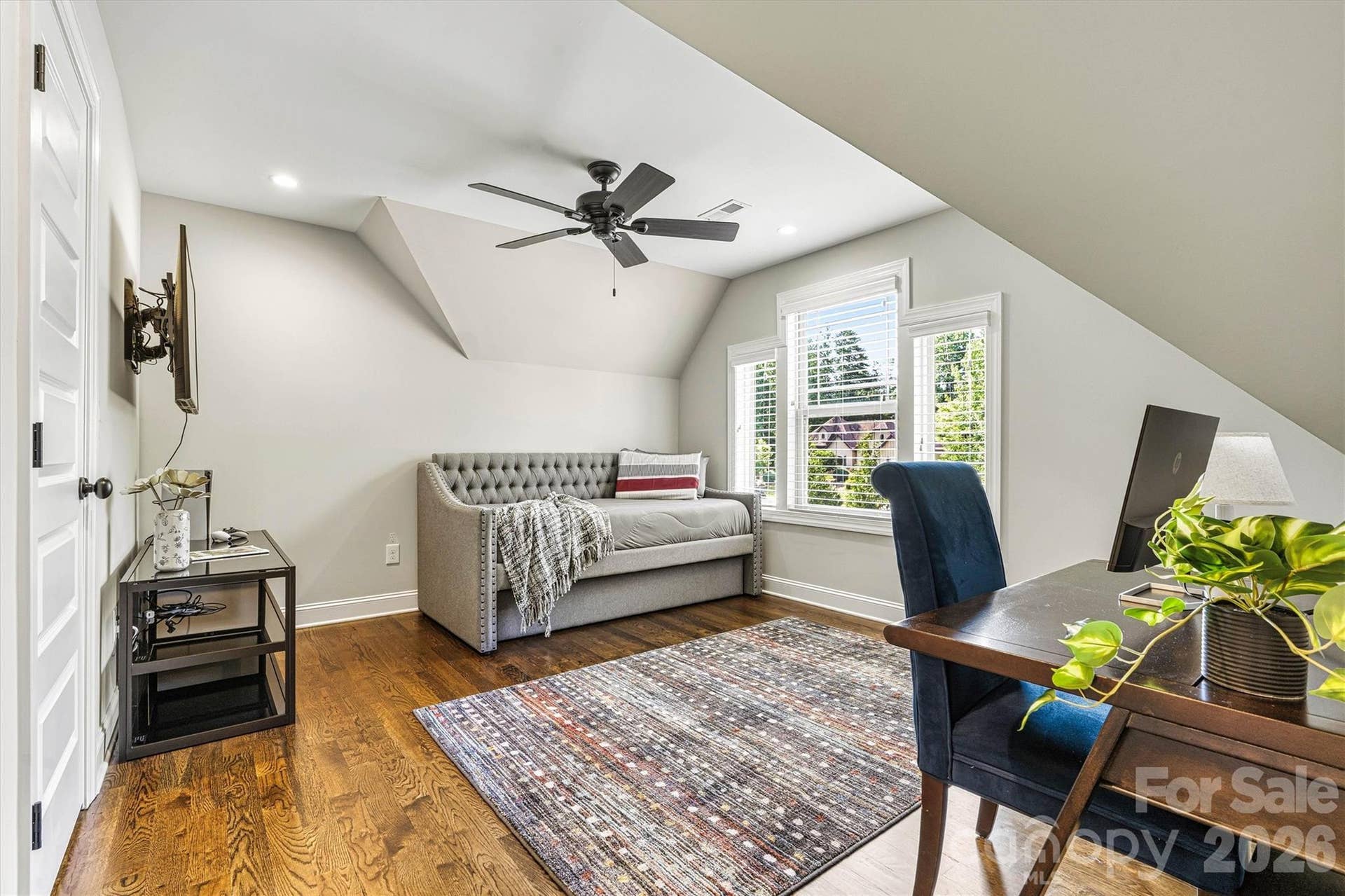 The loft area is the perfect space to use as a place to "hang" out, read, game or for crafting