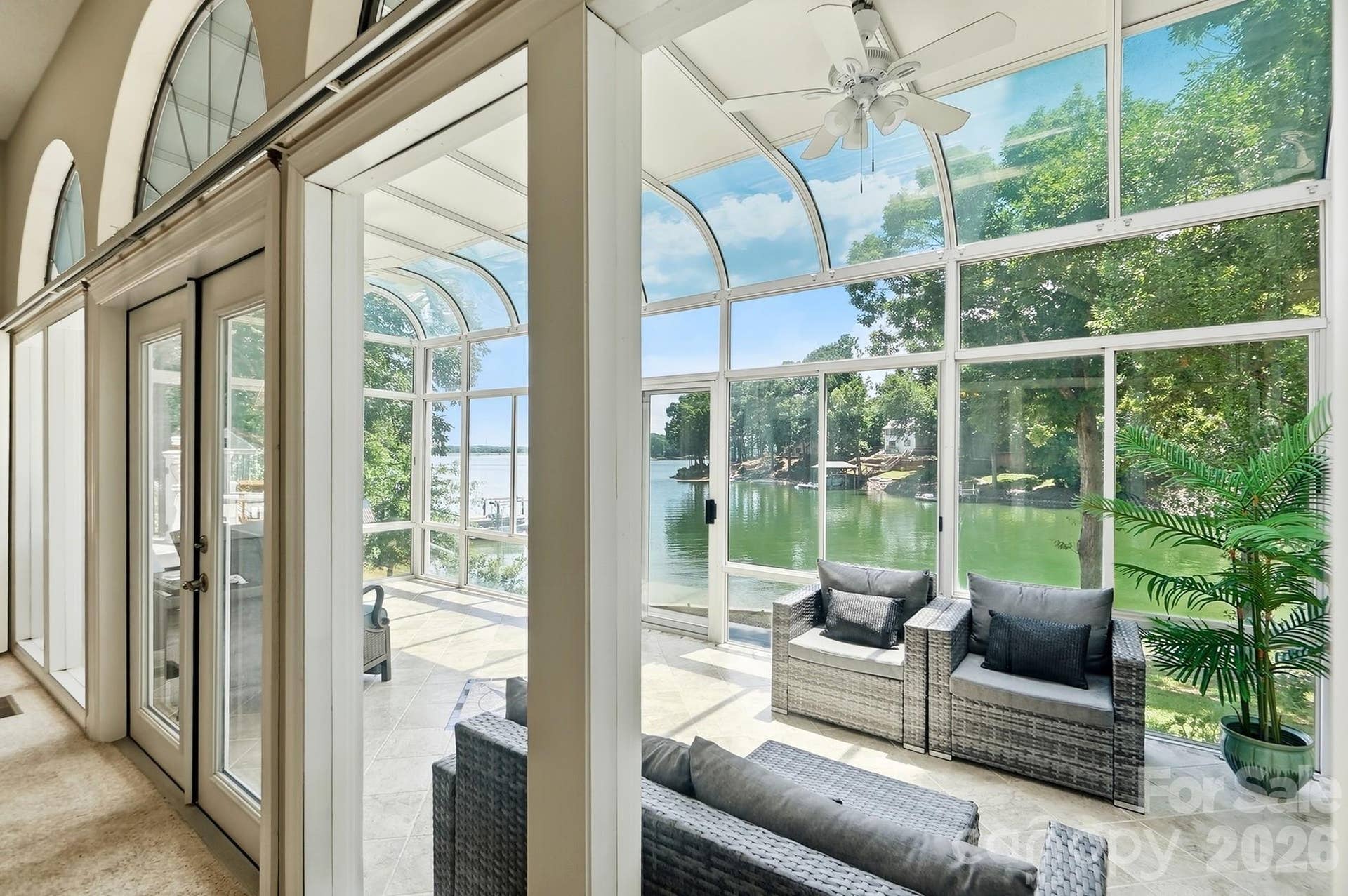 Sunroom is the perfect place to enjoy your morning coffee, unwind with a good book, or simply take in the panoramic water views